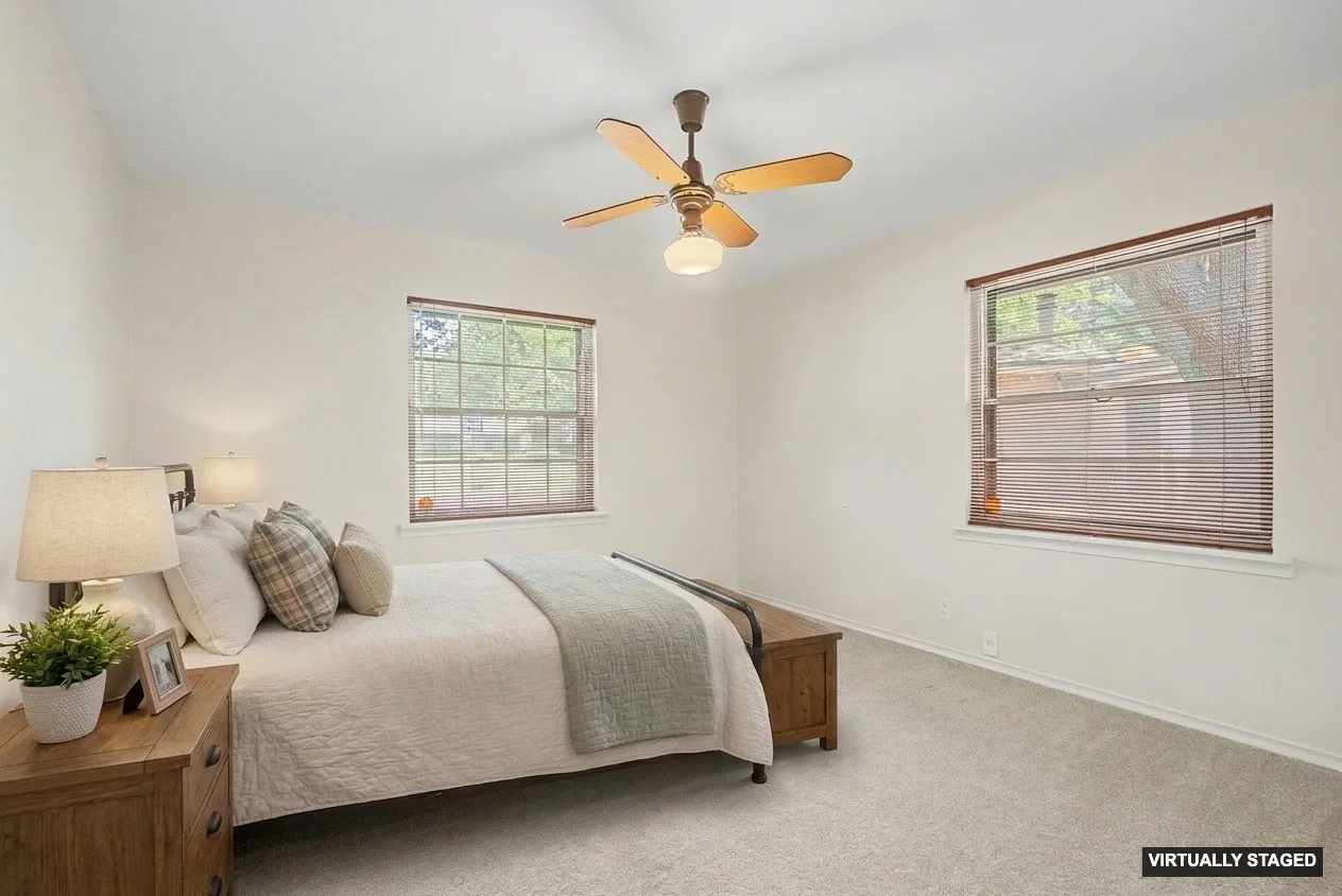 Virtually staged with furniture to show perspective.