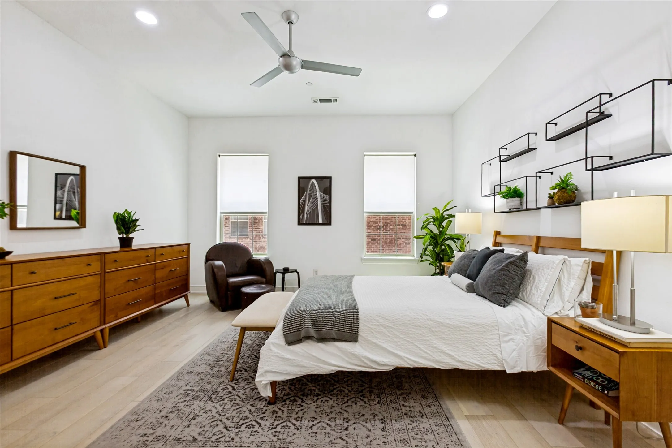 Primary bedroom with windows with view to pool!