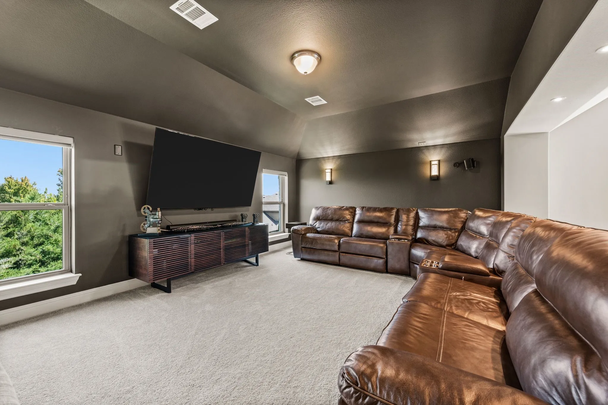Media room is pre-wired for sound; Home has Cat5 wiring and Smart Home controls for the oven, thermostat, garage door and sprinkler system