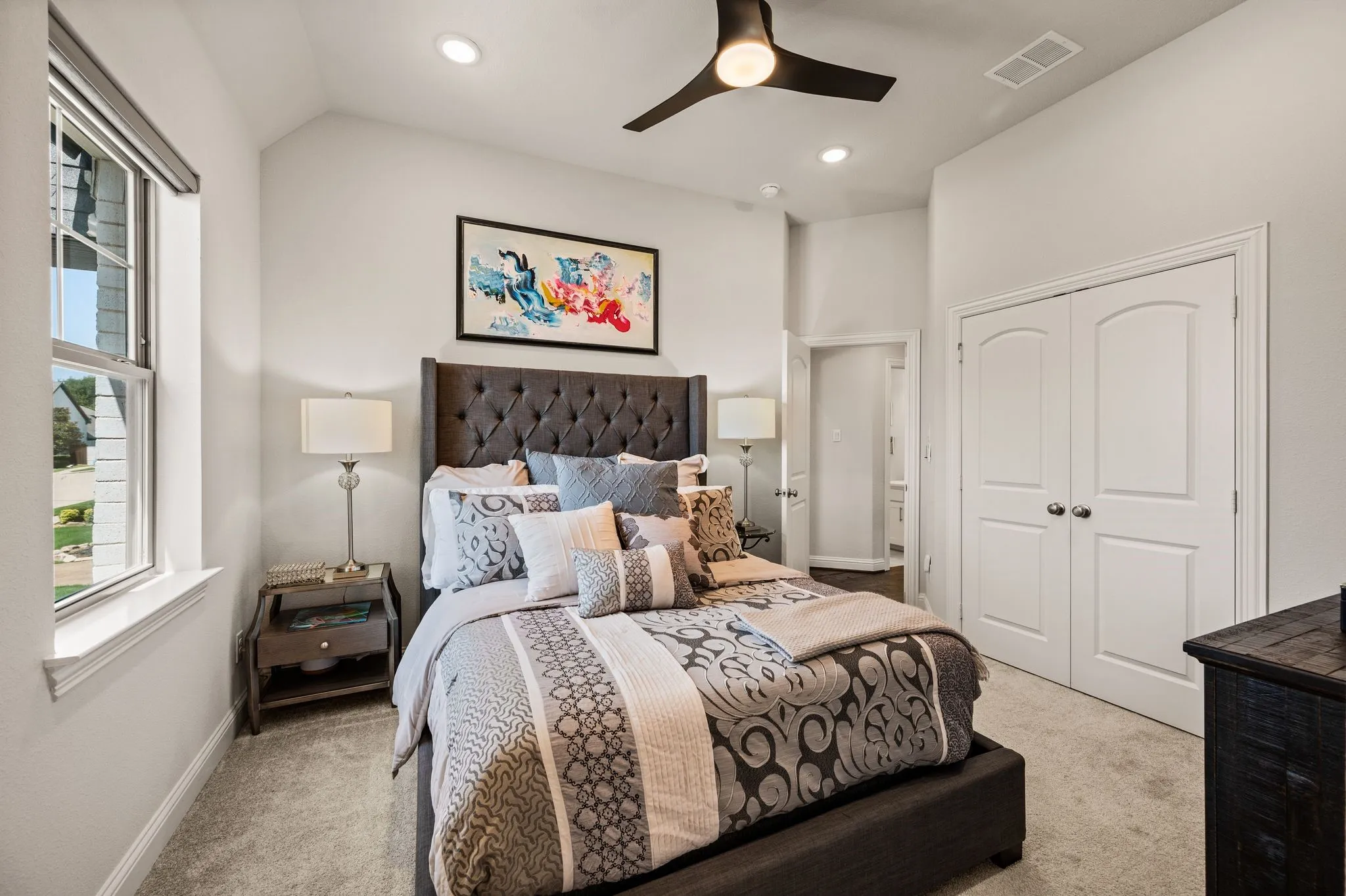 One of three upstairs bedrooms; Decorative Fan-light; Double closet entry