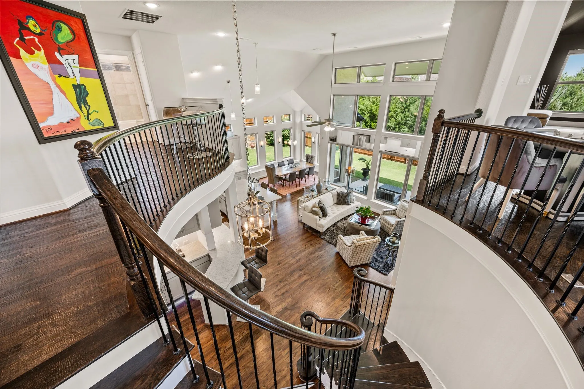 View from the top of the stairs; Hallway to right leads to two additional beds and bath; to left is the third upstairs bedroom, Hollywood bath and large retreat