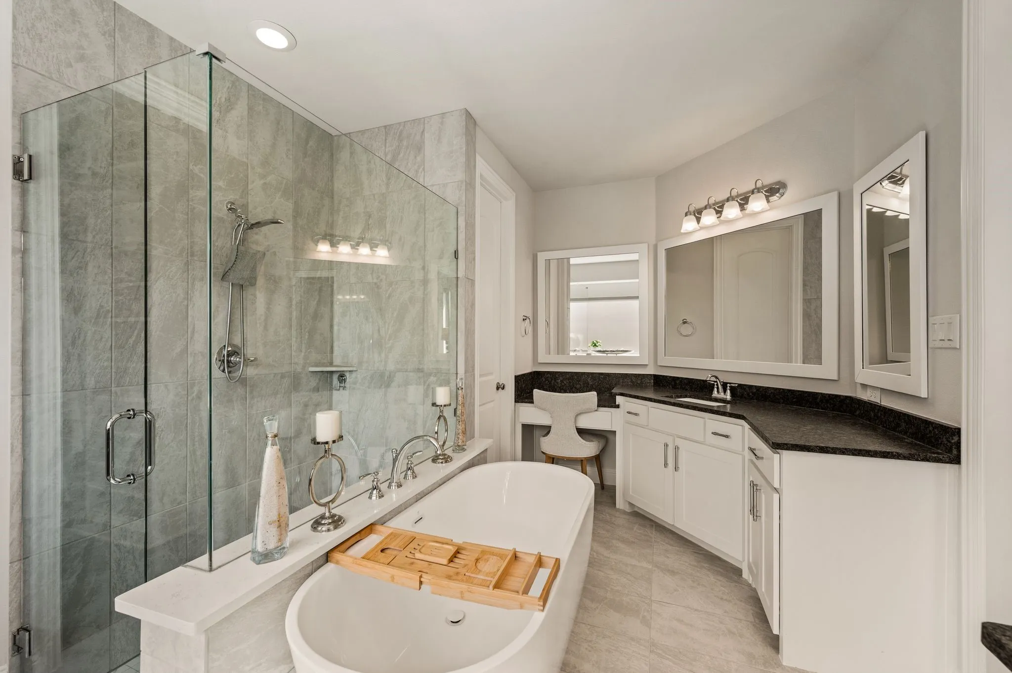 Built-in makeup table within this vanity station that's flooded with reflective light