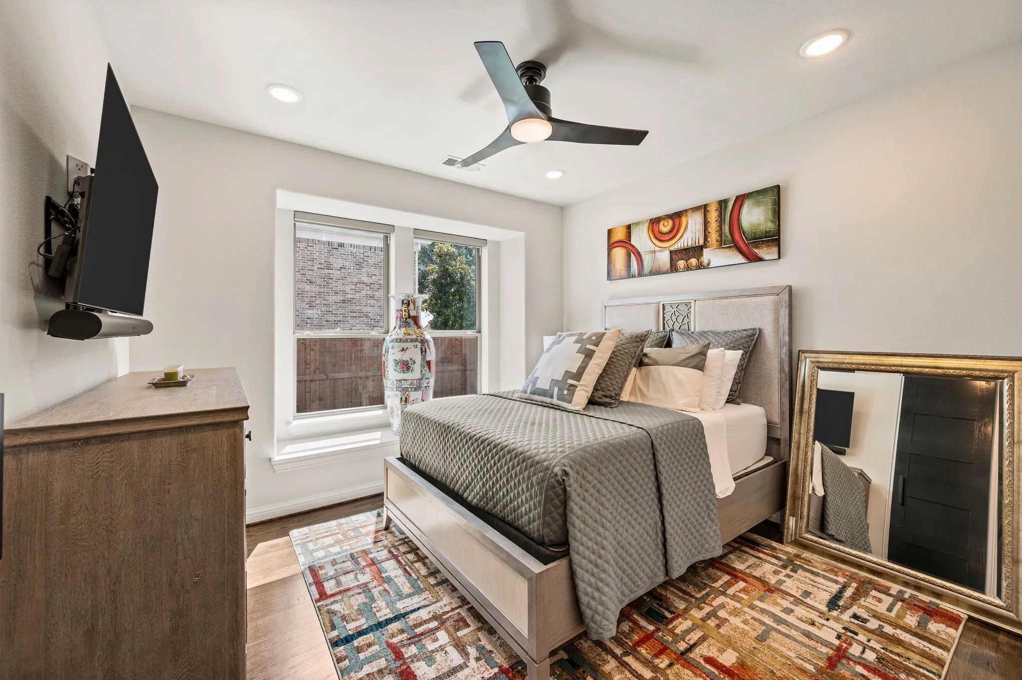 Downstairs Family, Guest or In-law suite; Decorative Fan-light; Window Seat; NOTE: ALL WINDOWS HAVE motorized ZEBRA BLINDS (not shown in photos but will seen during showings)