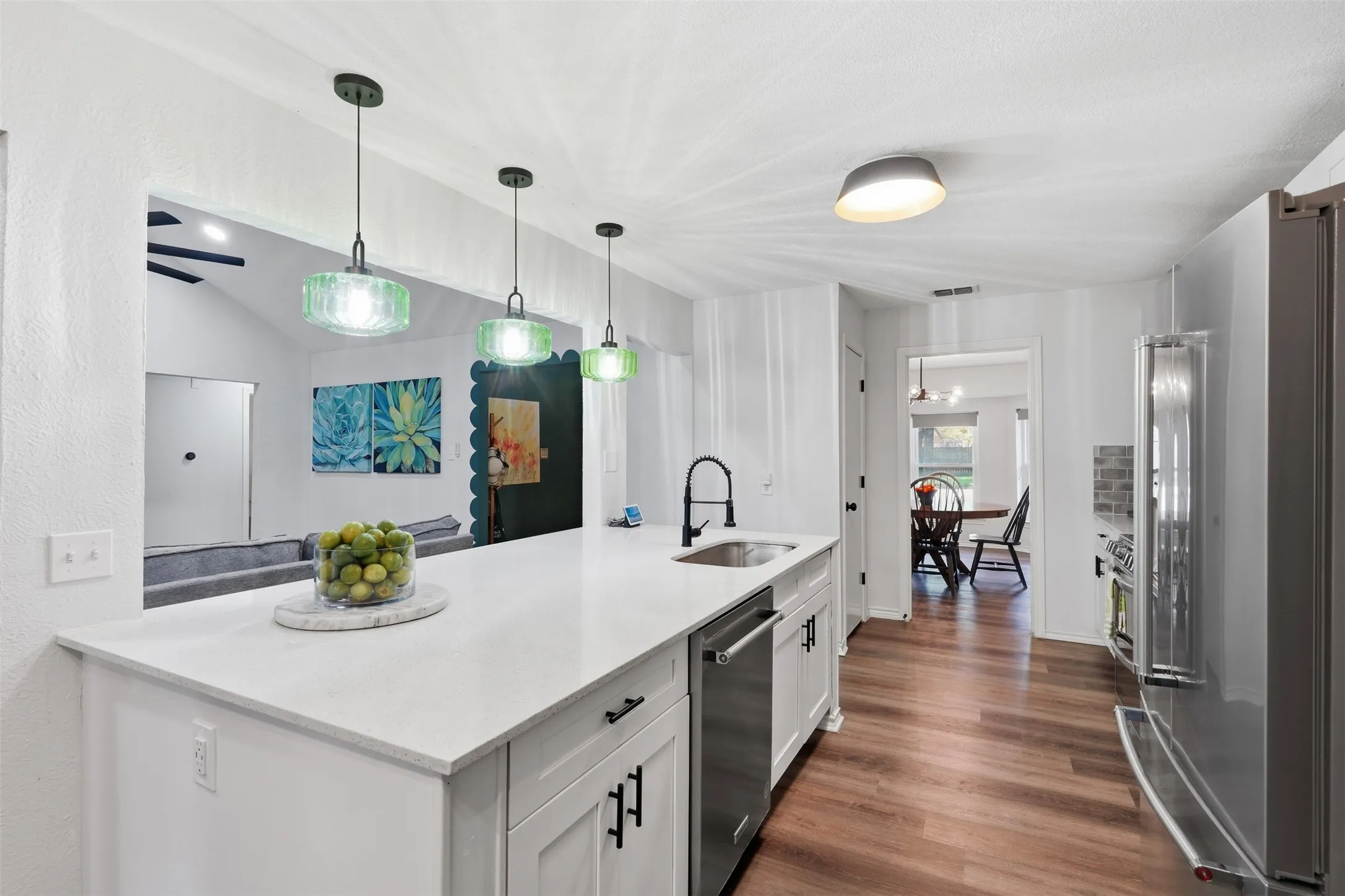 Large island with quartz countertops, tons of storage