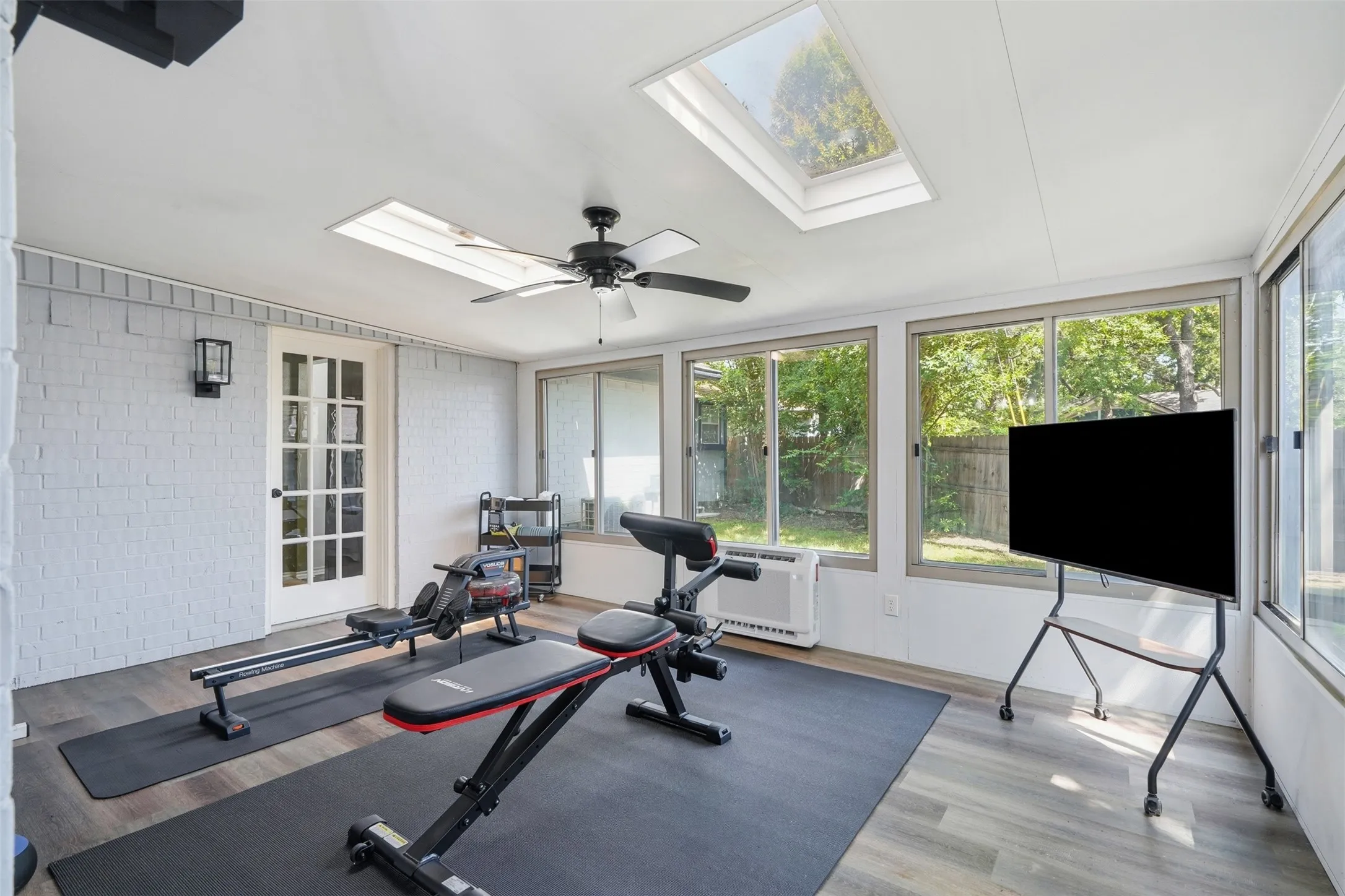 Enclosed sunroom with 2026 mini-split