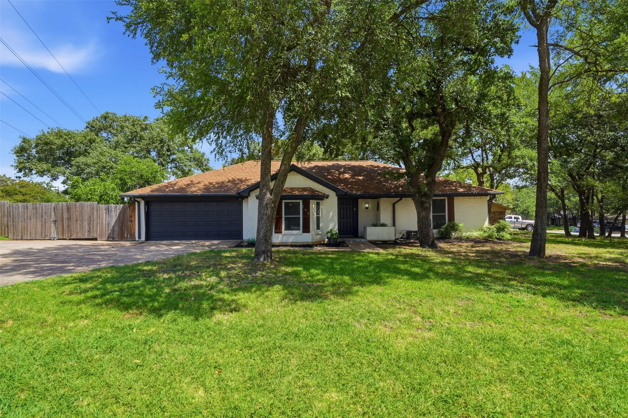 3 bed, 2 bath + sunroom home on .3 acre corner lot. Extended driveway for gated parking for RV's, trailers, boats. Currently used for outdoor living.