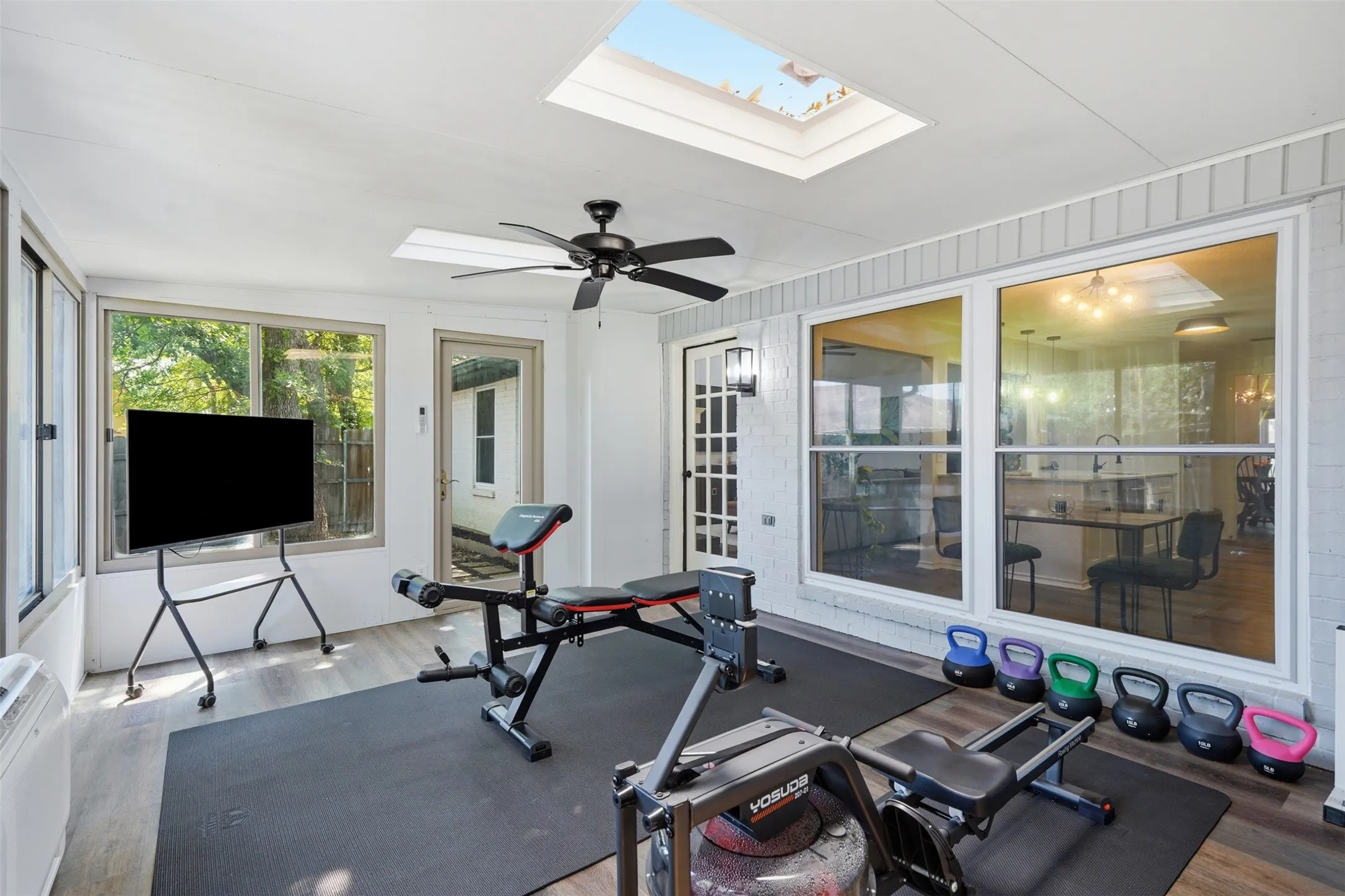 Enclosed sunroom with 2026 mini-split