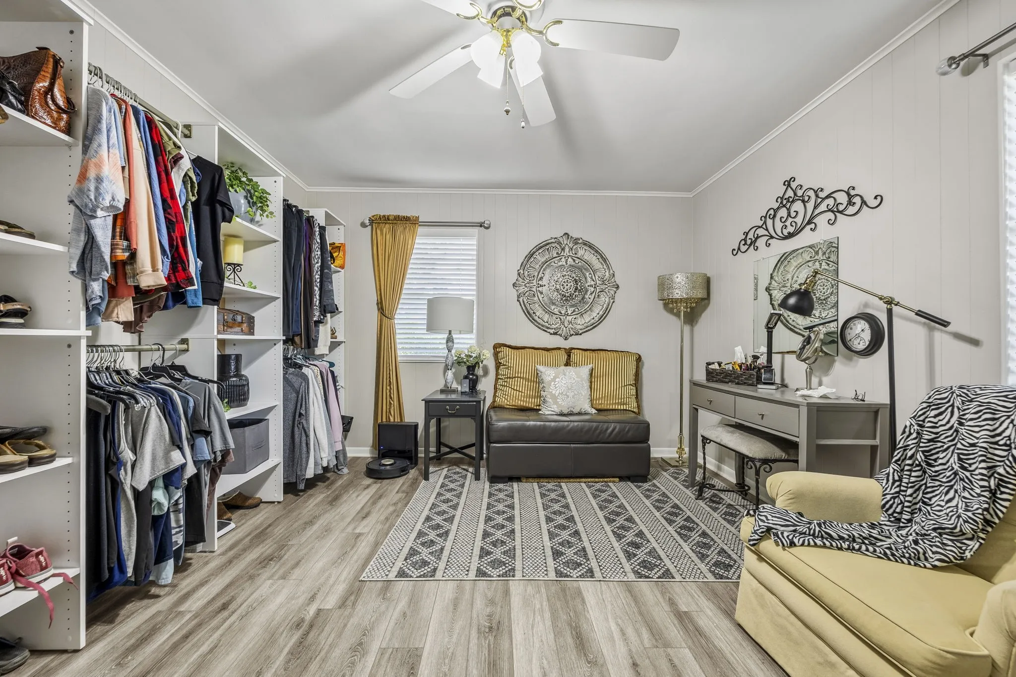 Oversized guest bedroom with built in closet system.