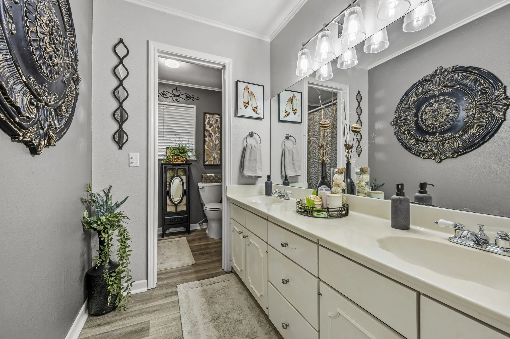 Double vanity featuring integrated sinks and ample countertop space