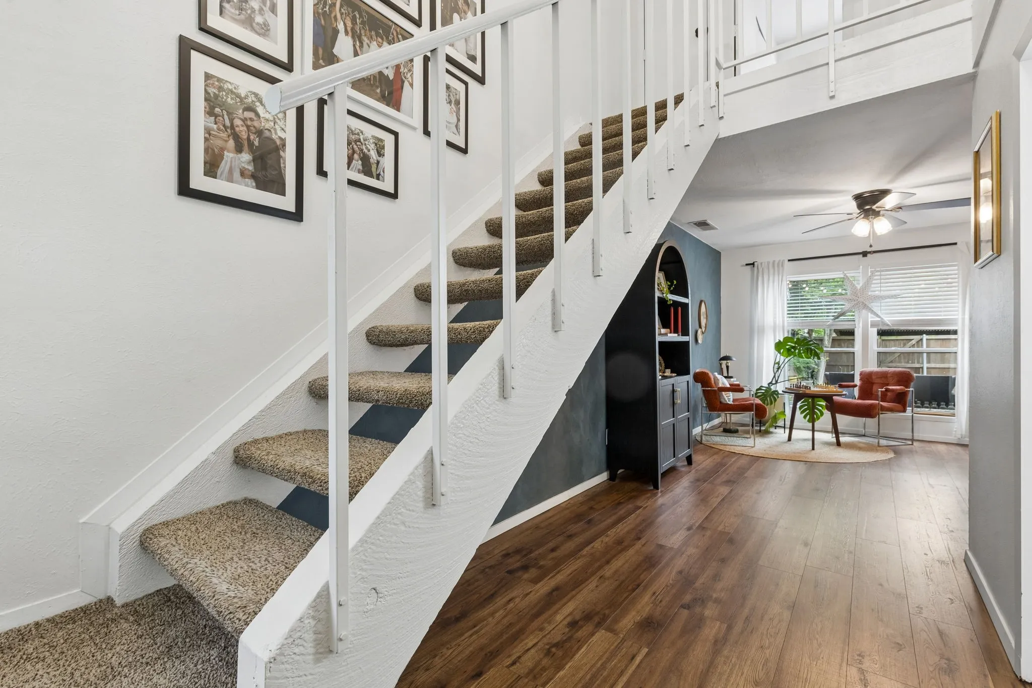 Floating staircase exemplifying the mid-century modern vibe.