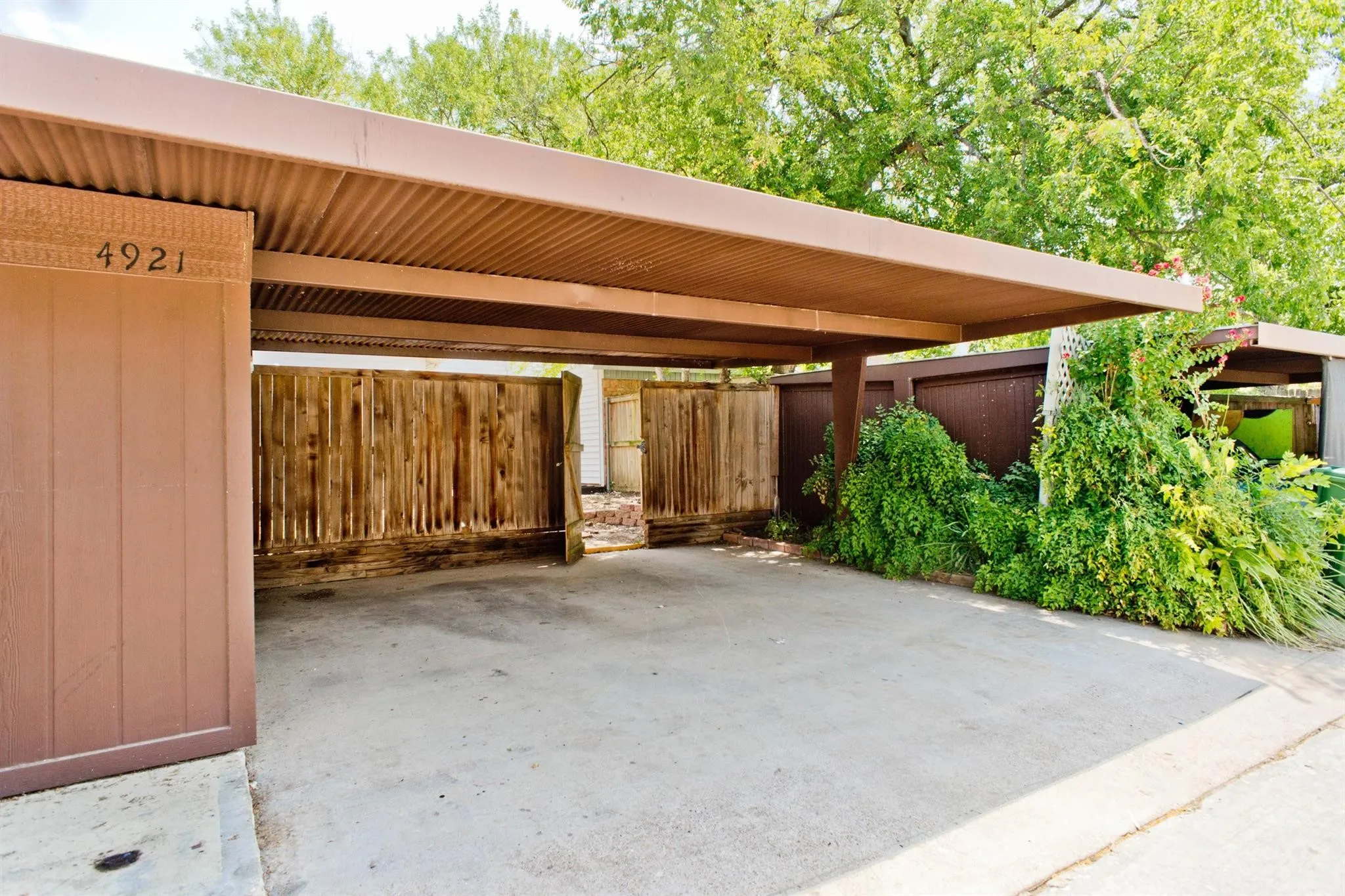 2 covered parking space located in the rear of the home.