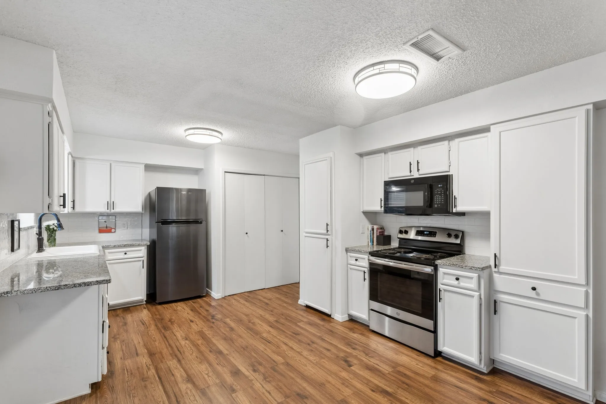 Kitchen is light and bright.