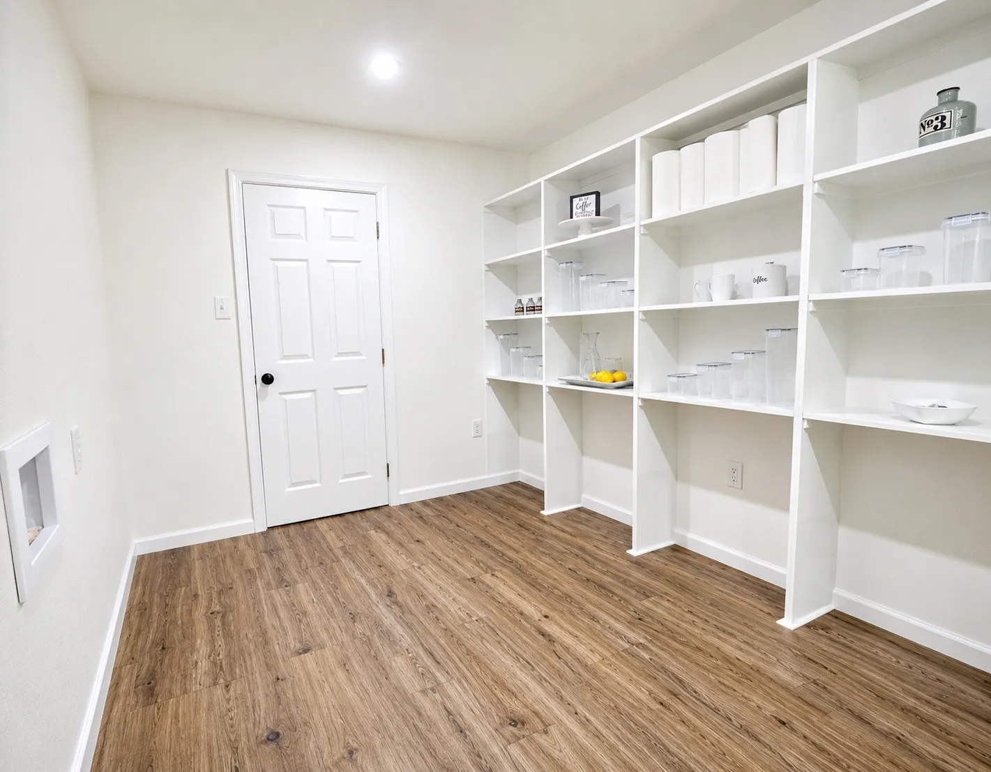 Huge walk-in pantry and laundry room.