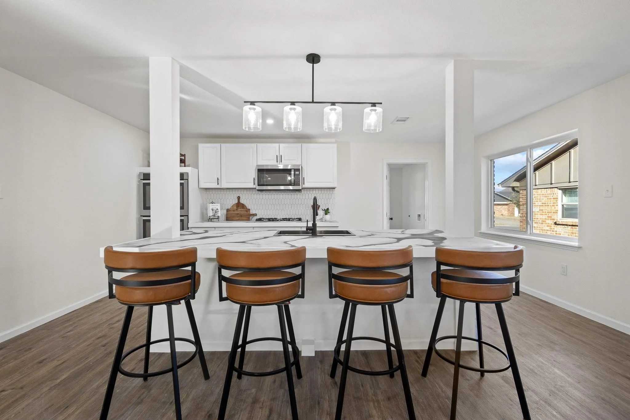 Updated kitchen with large island.