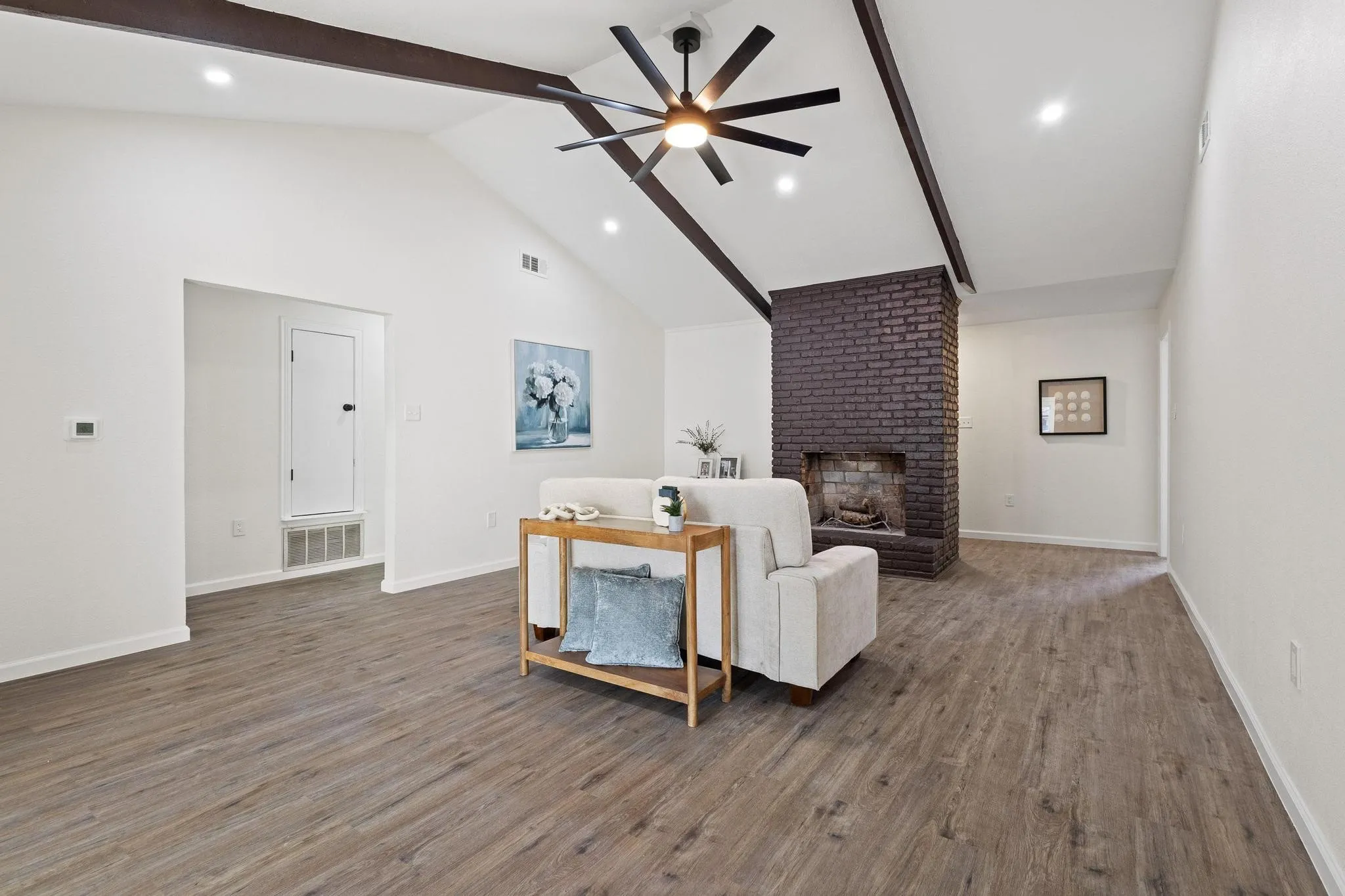Vaulted ceilings and a cozy fireplace.