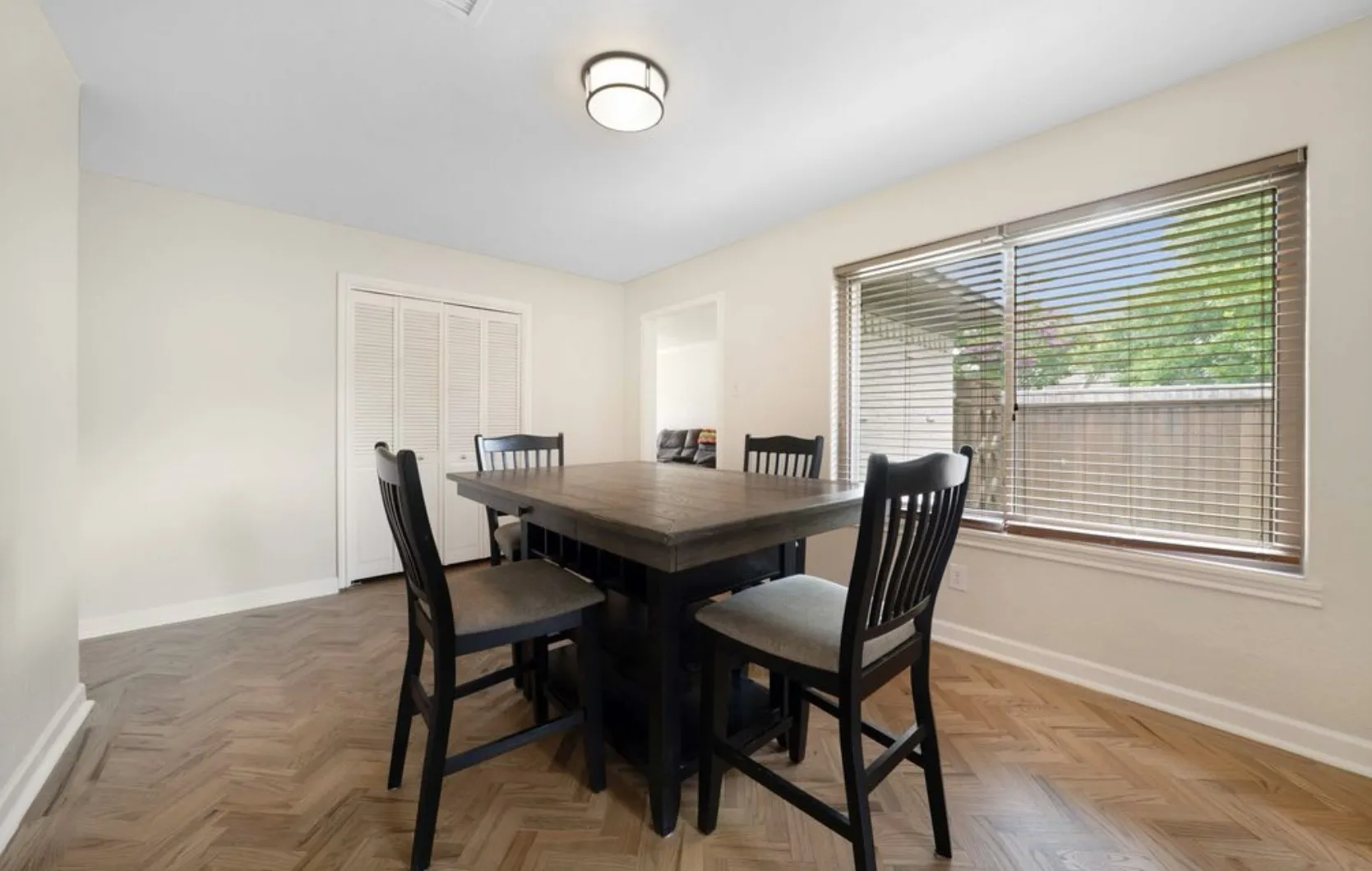 Windows bring in wonderful natural light into the dining area