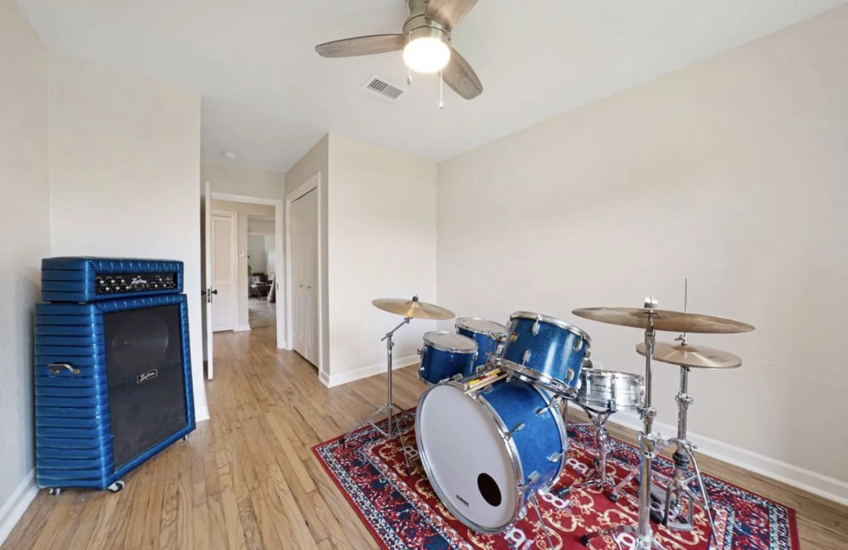 2nd bedroom is currently a music room, but as you can see wooden floors throughout the home!