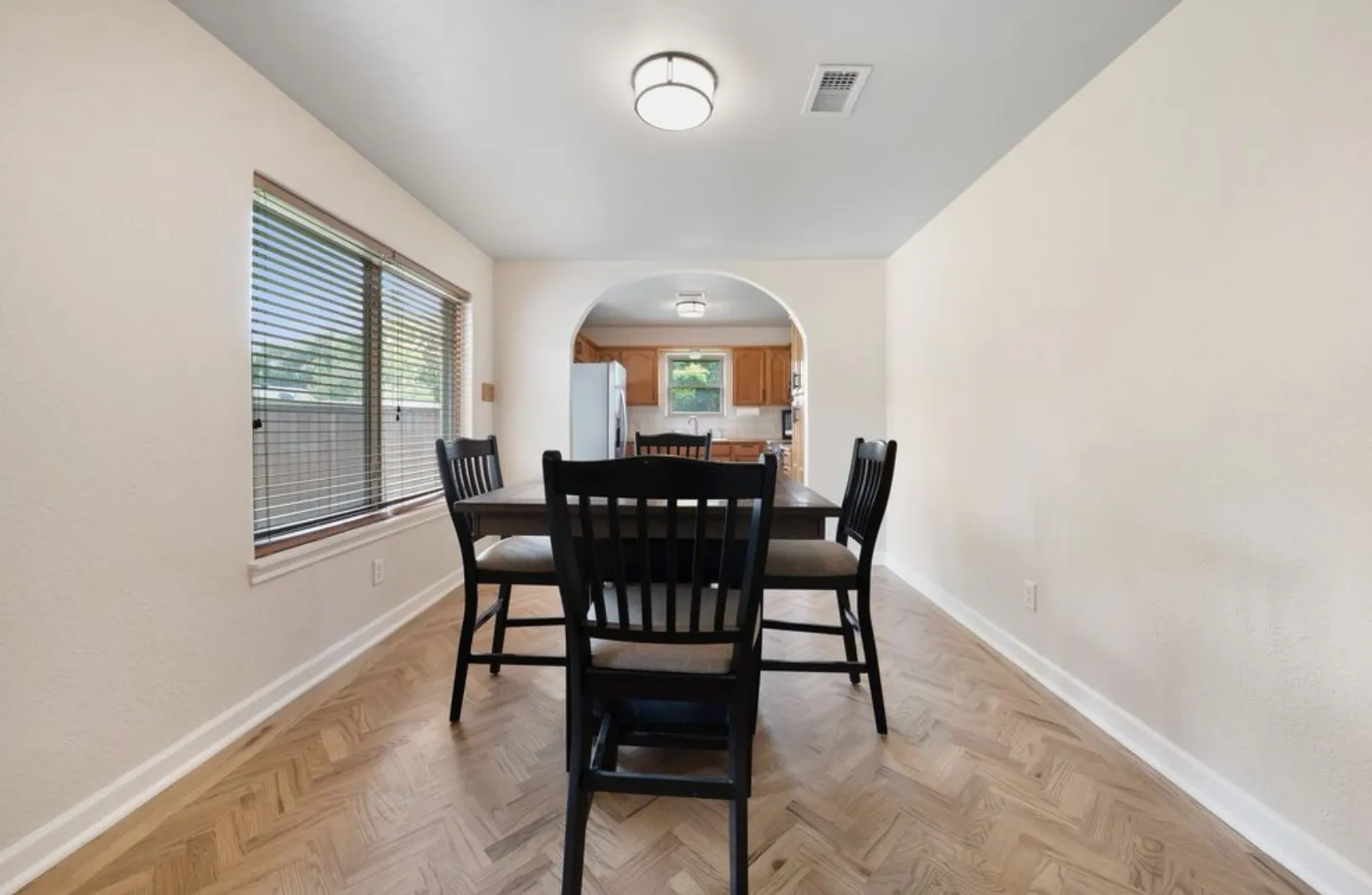 Look at that herringbone flooring!