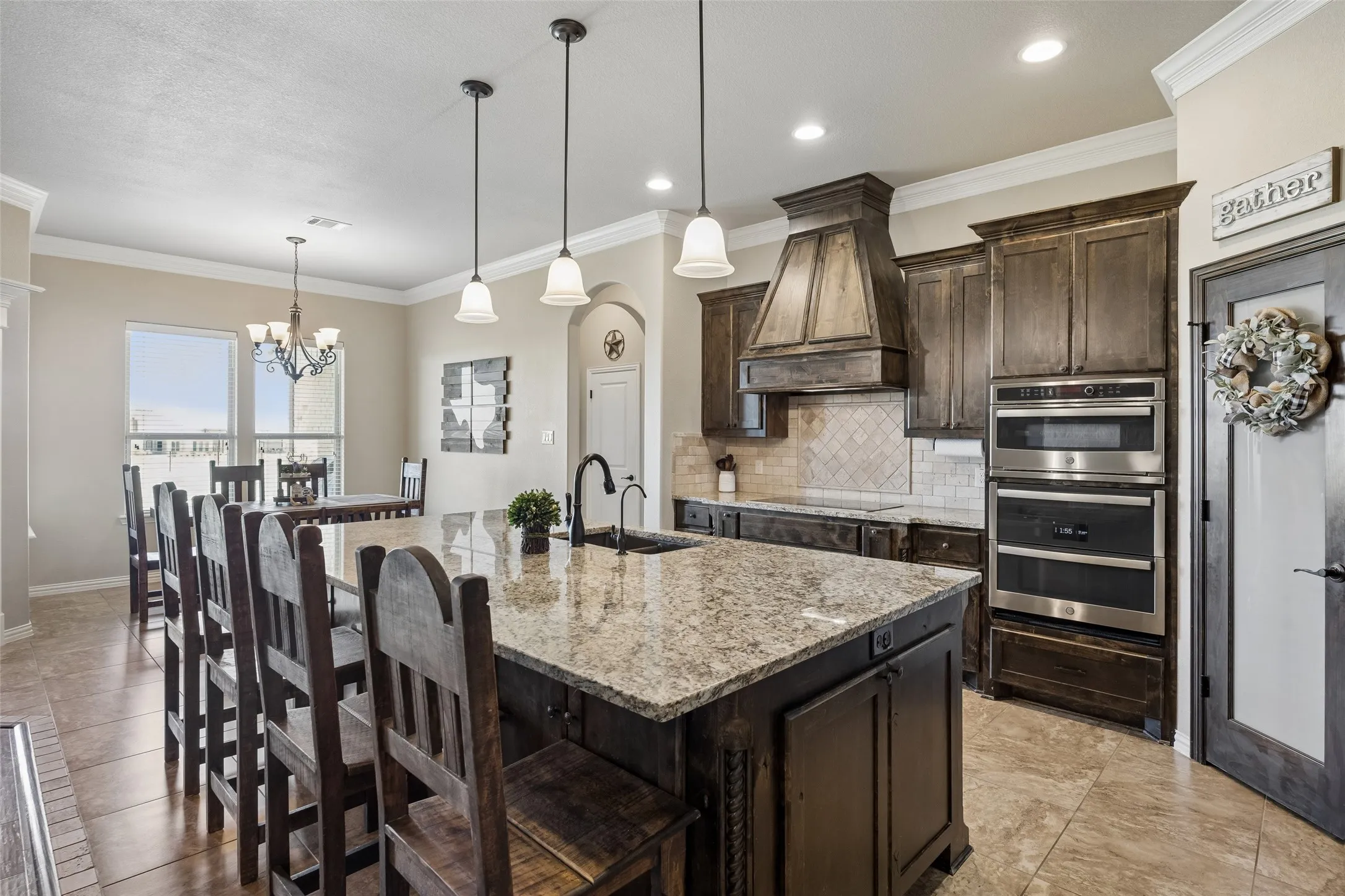 Large kitchen island with granite countertops