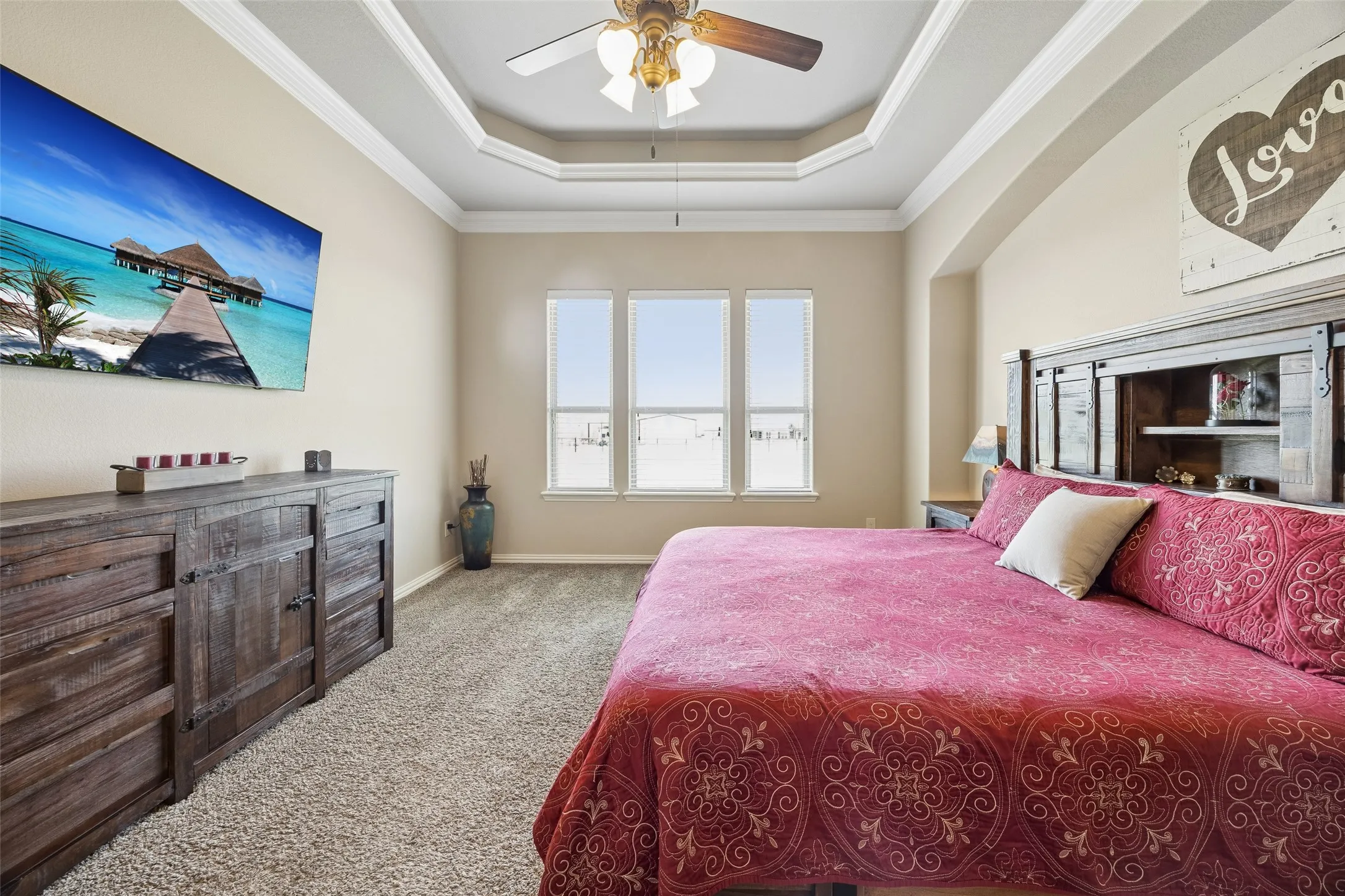 Primary suite with view to the acre lot