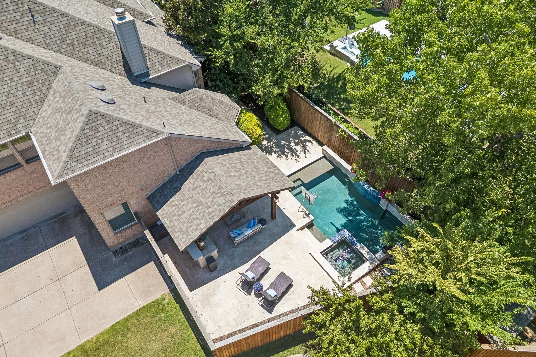 Mature trees provide excellent shade and privacy throughout the day