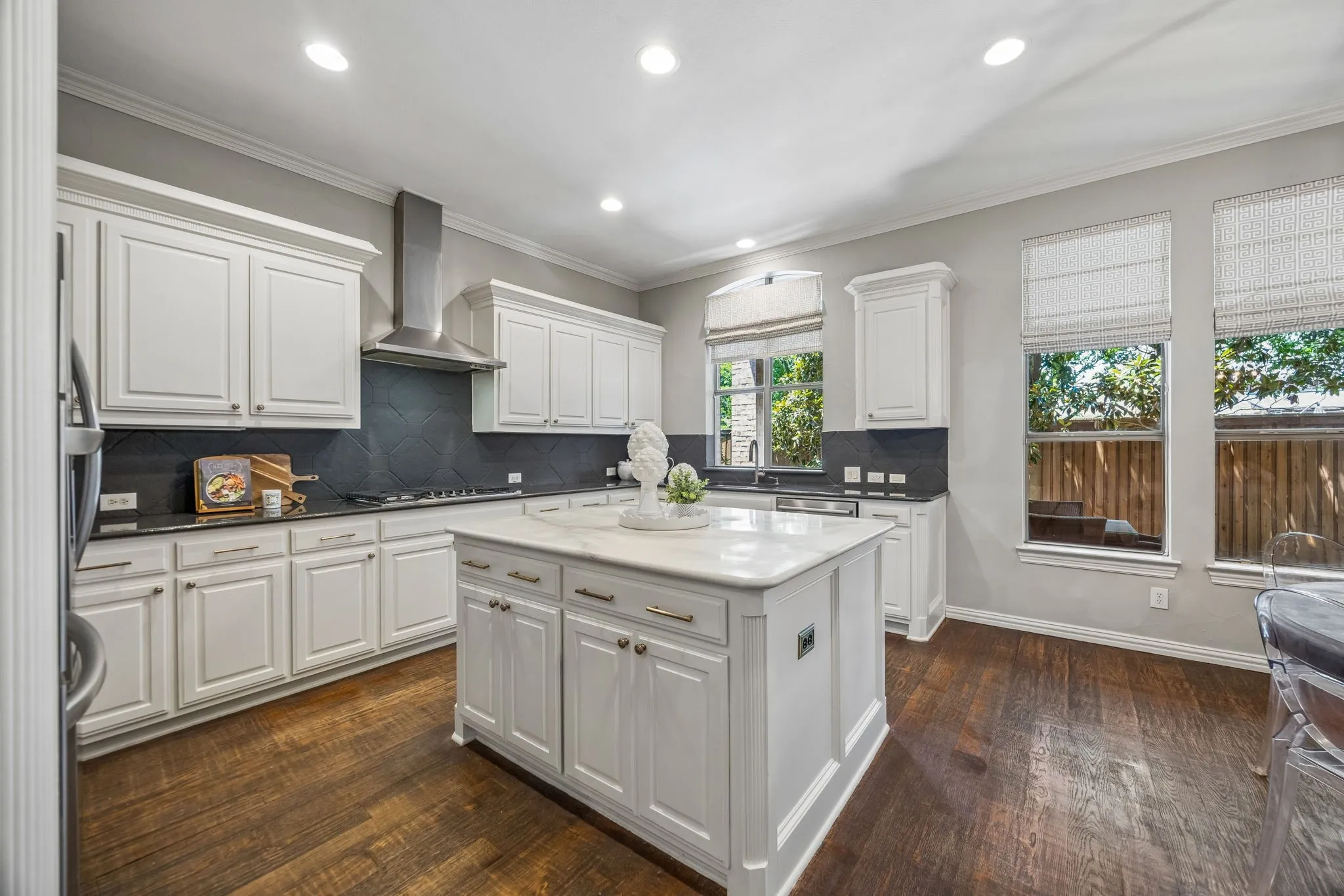 Large kitchen with neutral colors and center island