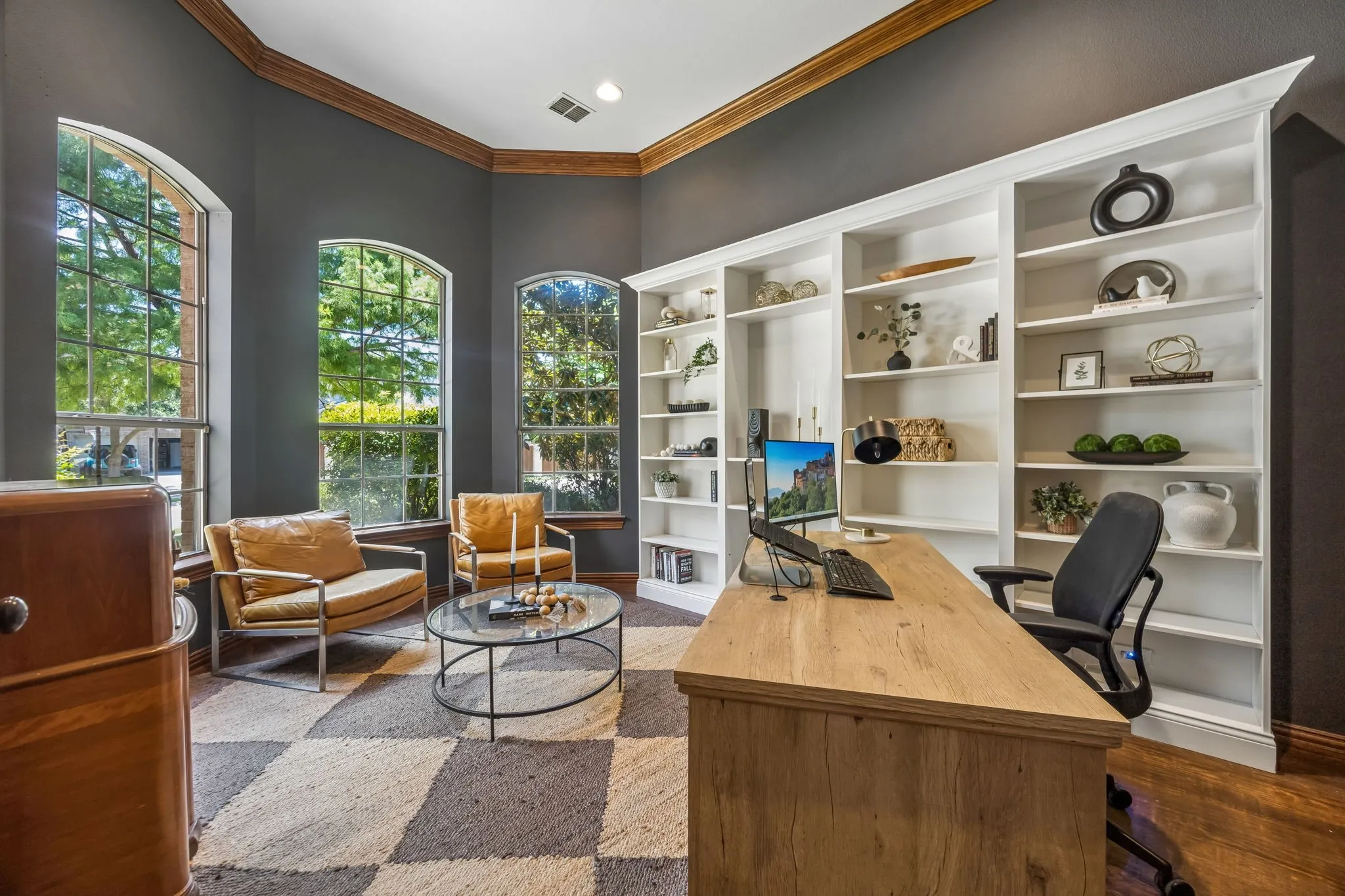 Spacious home office with built in shelving
