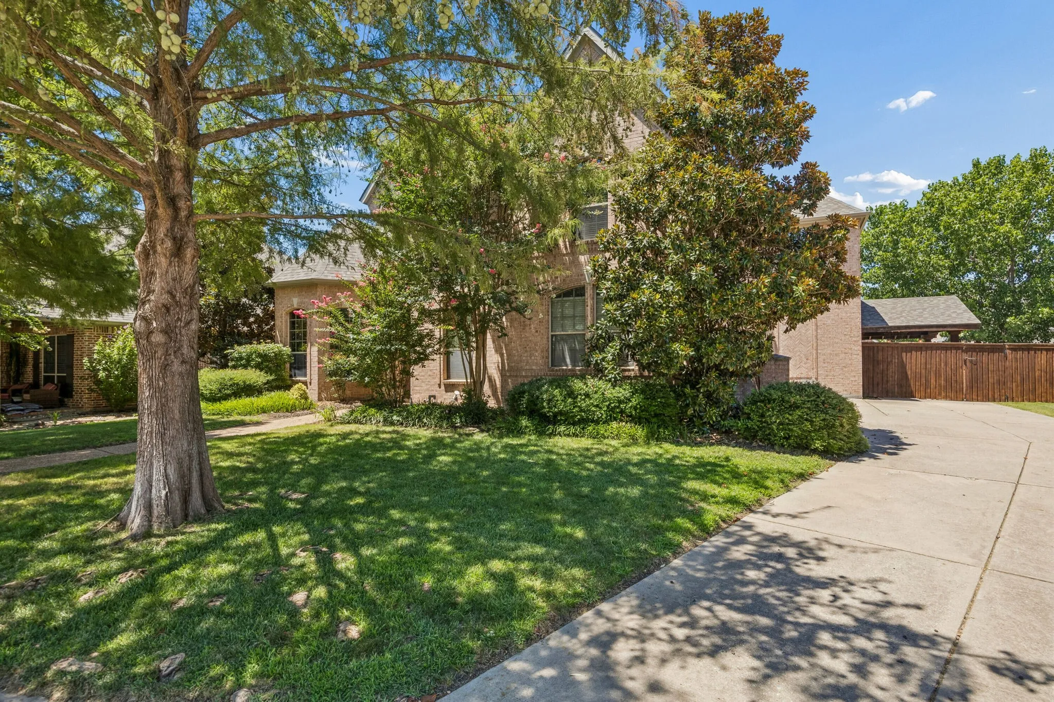 Mature trees provide privacy and shade