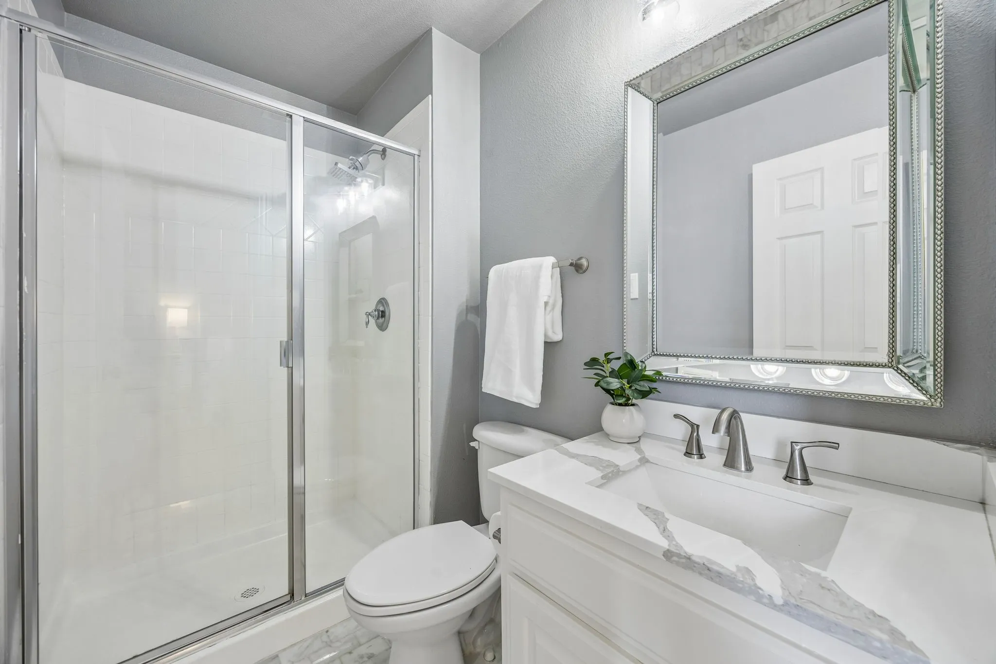 Secondary bathroom with updated vanity