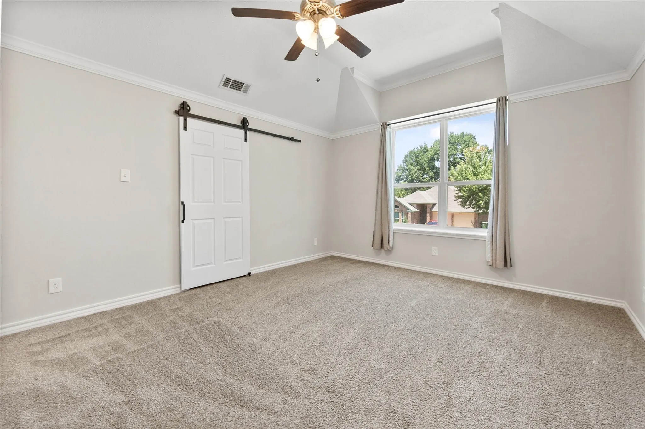 Primary bedroom with oversized walk-in closet