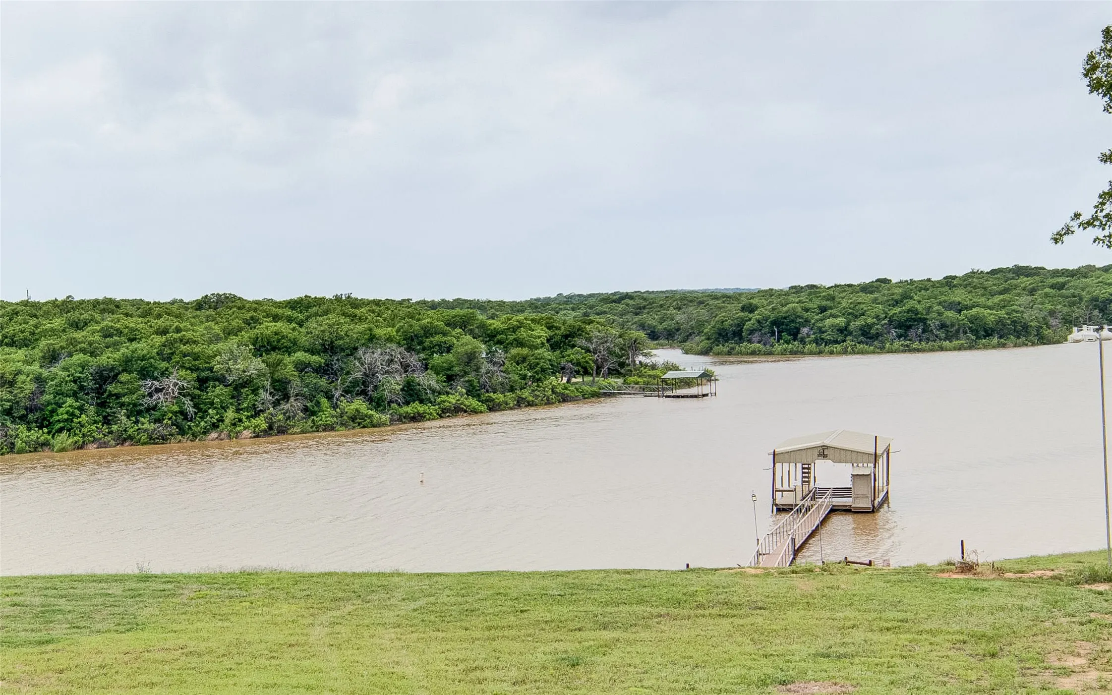 Single Family Residence For Sale in Wise County , 133 Sunset Bay Pointe Court, Chico, Texas 76431, 4 Bedroom, 4 Bathroom, 3 Garage spaces, 3,030 Sqft, built in 2020, mls#21339687, Real Estate Agent in Chico, Homes For Sale in Wise county, Homes For Sale in Chico, Realtor in Chico Texas, Real Estate Brokerage Independent Realty Texas, Luminita Cordes Realtor