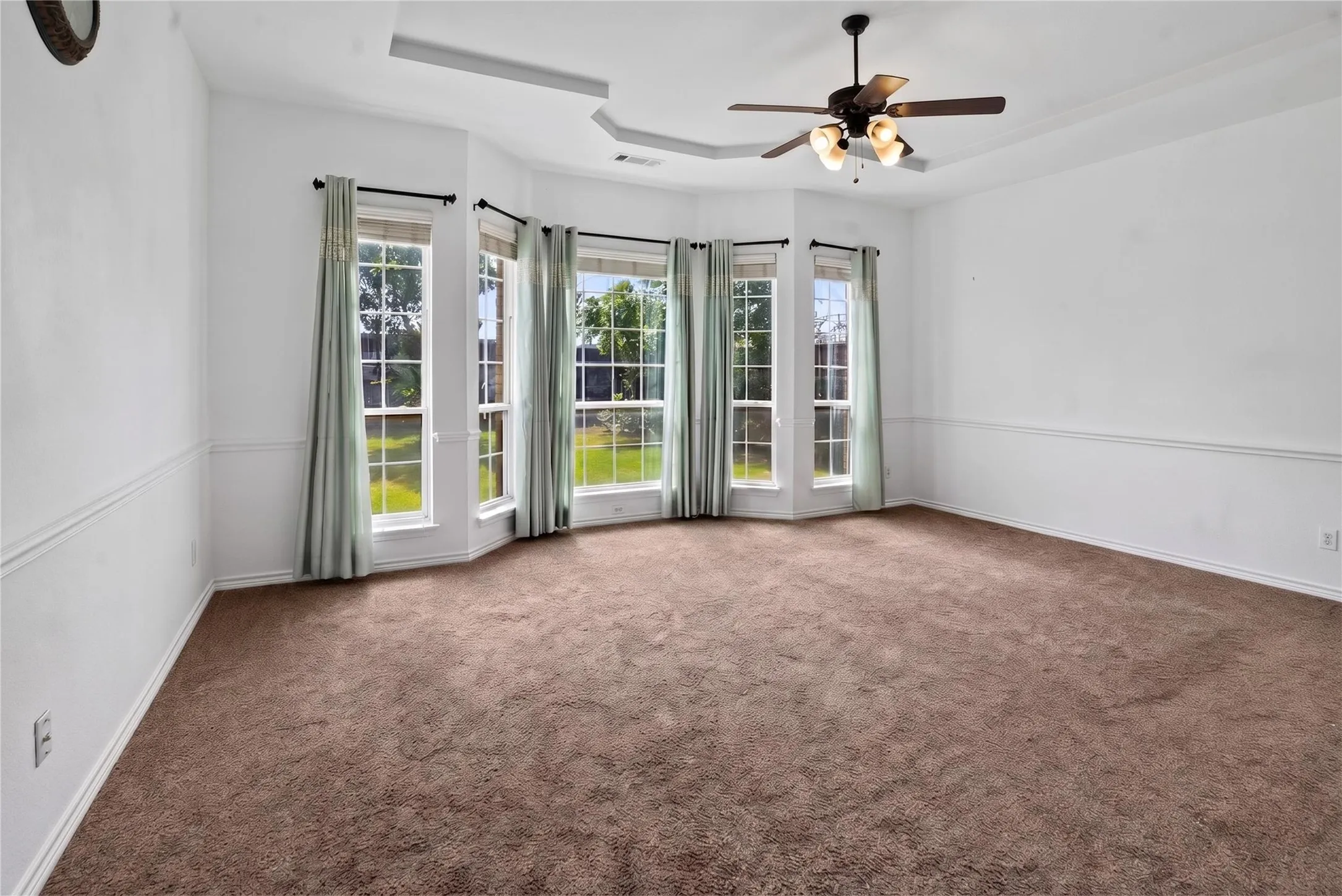 Classic bay windows looking out to your yard!