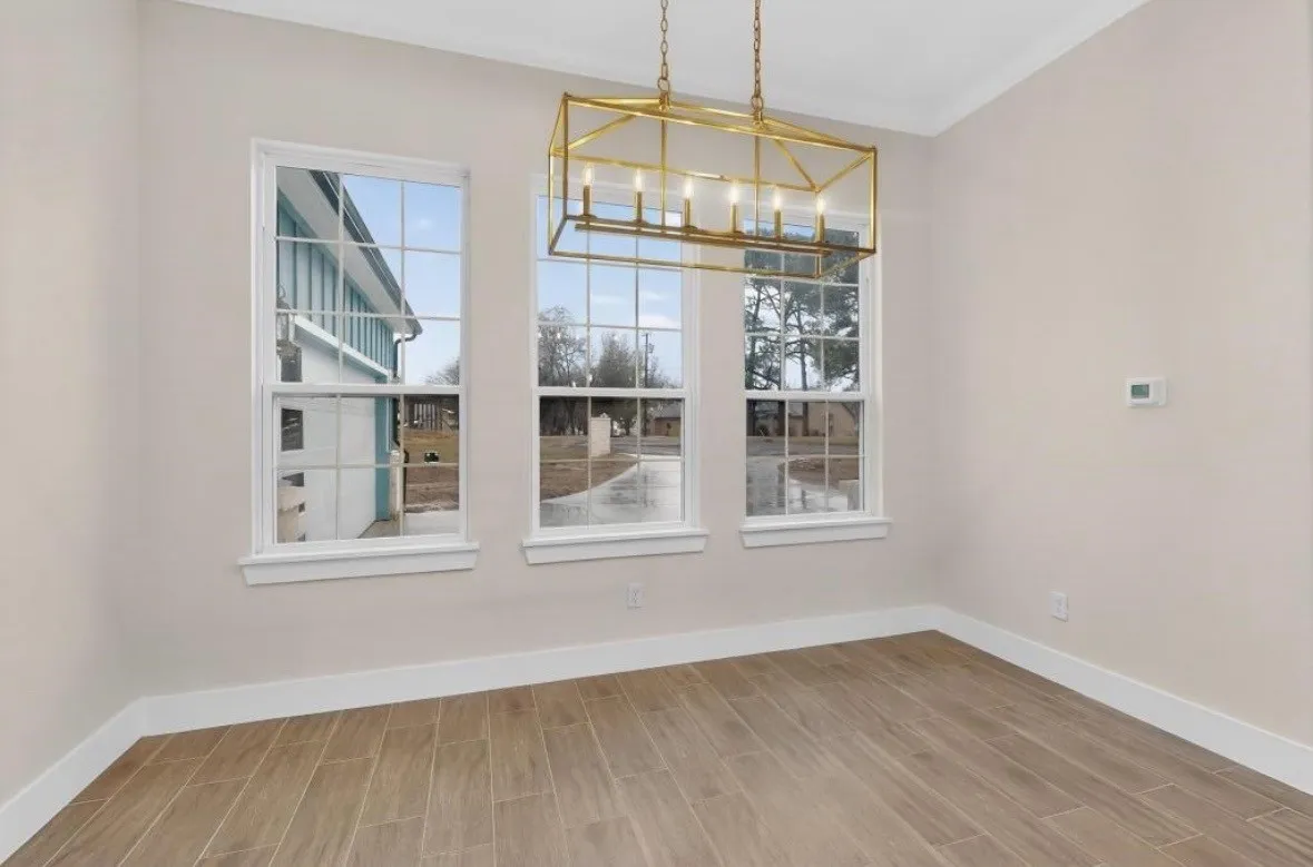 Rectangular chandelier with a gold-tone finish and five exposed bulbs