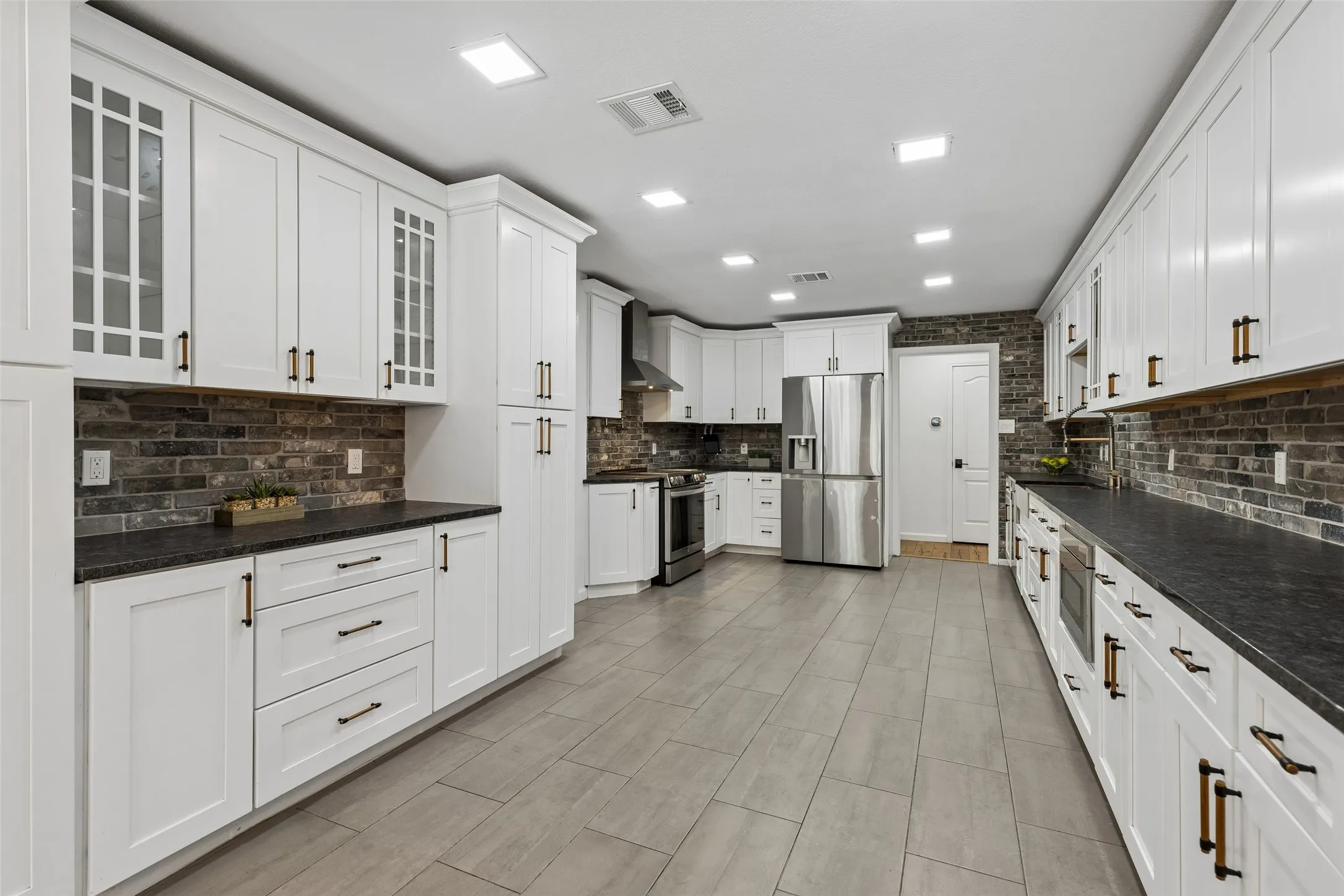 Expansive, room for several cooks. Imagine making cookies with the little children.