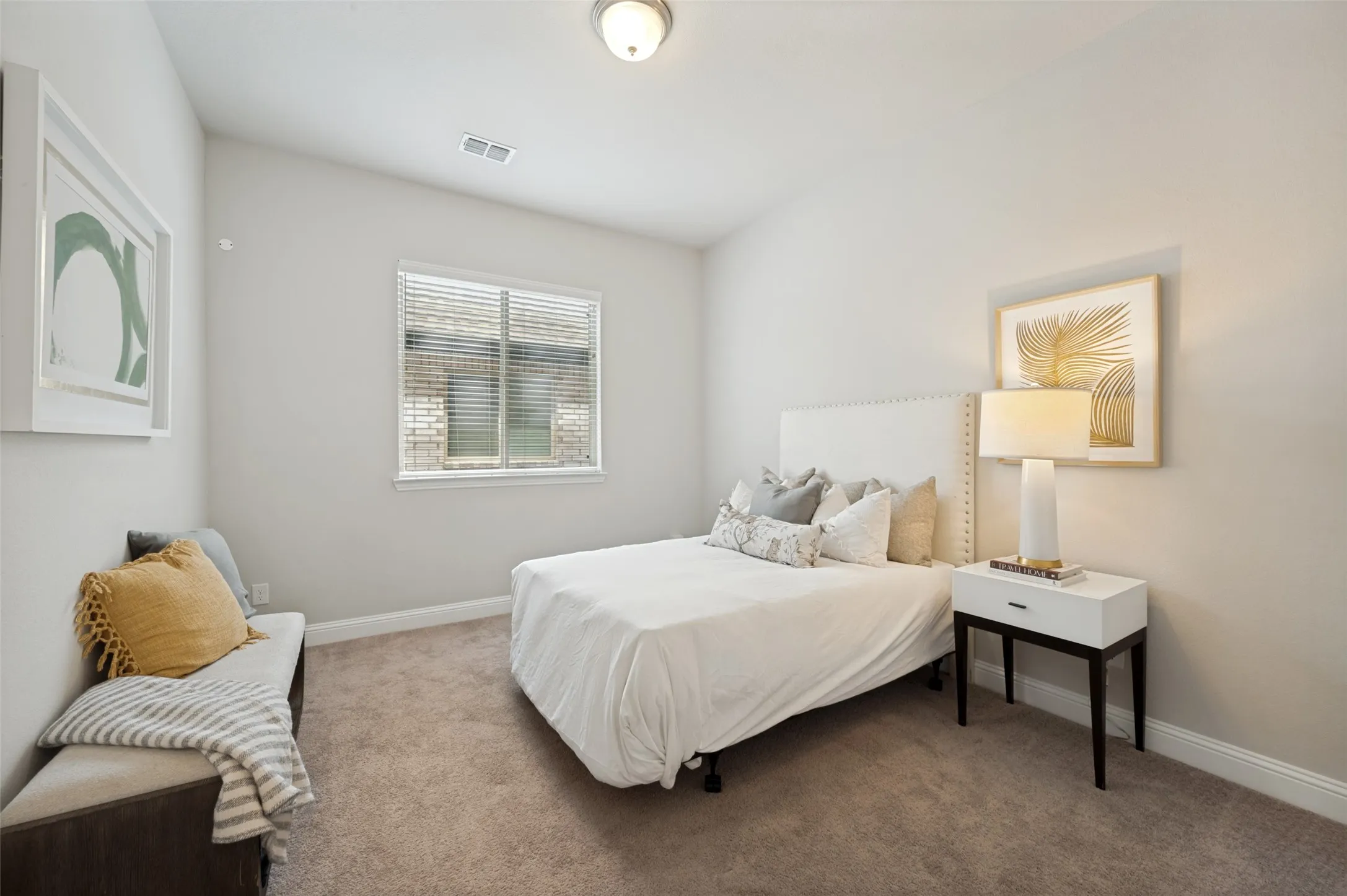 Conveniently located on the first floor, this spacious secondary bedroom offers privacy and flexibility for guests, multigenerational living, or a home gym. Featuring plush carpeting, abundant natural light, and easy access to a nearby full bathroom, this versatile space provides comfort and convenience for family and visitors alike.