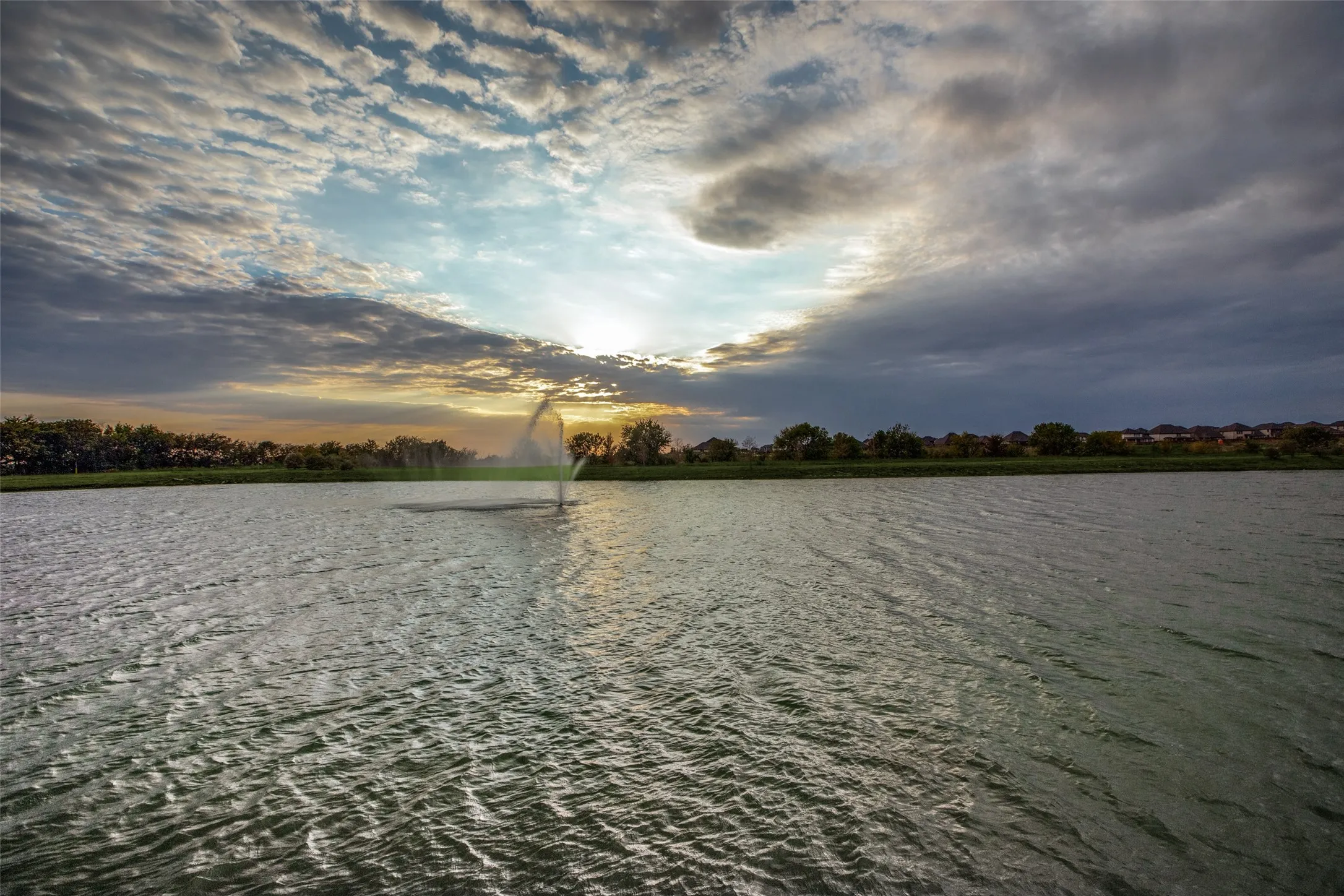 Enjoy the beautiful community pond and walking trails, offering peaceful views and a relaxing outdoor atmosphere. The tranquil water feature and open sky create the perfect backdrop for morning walks or evening sunsets.