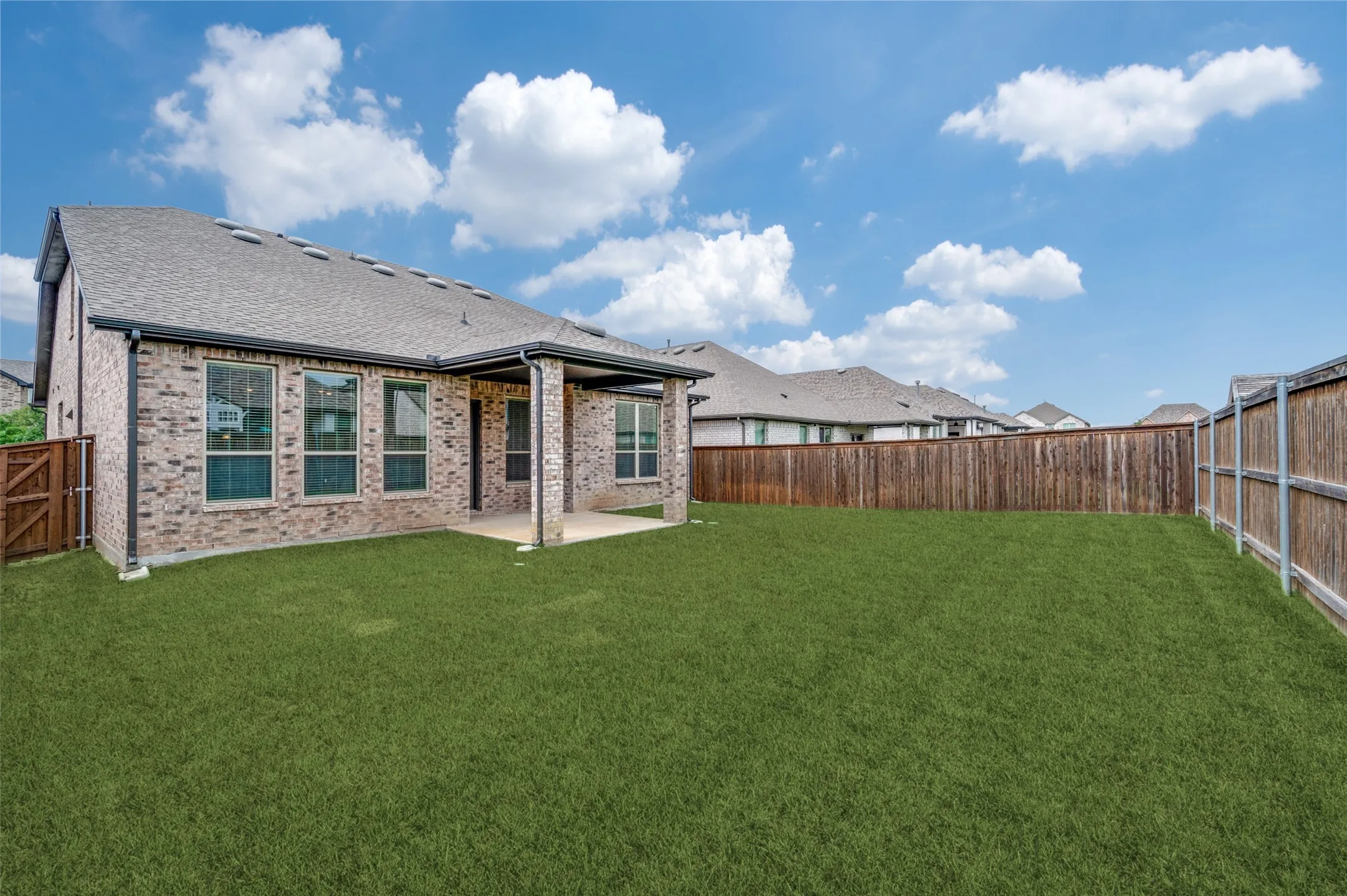 Step outside to a spacious, fully fenced backyard offering plenty of room for pets, play, gardening, or future outdoor enhancements. The covered patio provides the perfect space for grilling, entertaining, or relaxing while enjoying the privacy of your outdoor retreat.