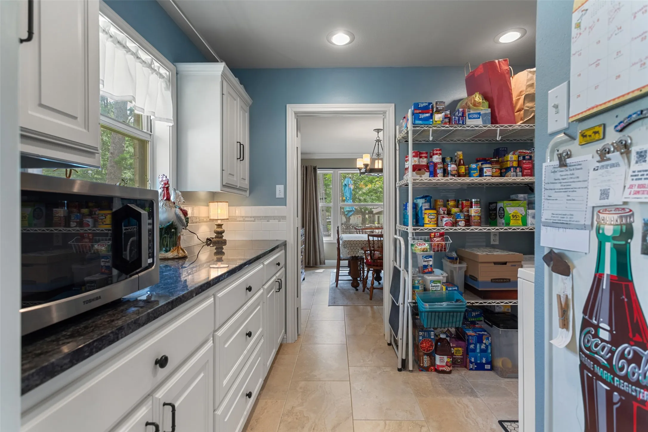 Butlers pantry / storage /laundry - great space between the kitchen and dining!