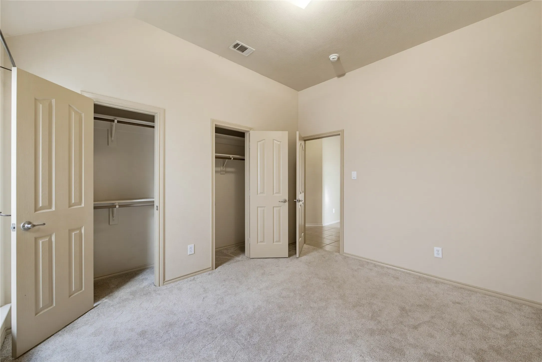 4th Bedroom with an extended closet and vaulted ceilings!