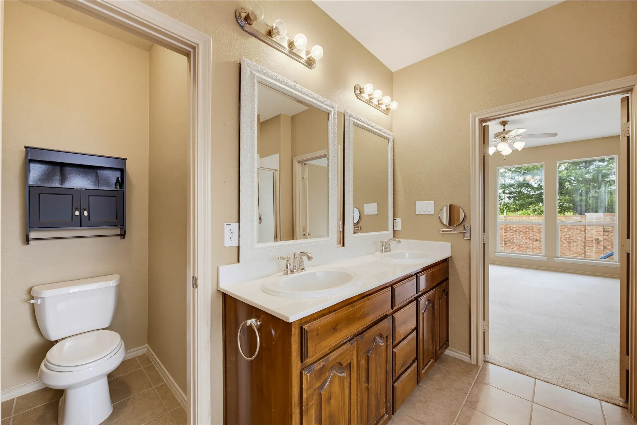 Dual sinks in the ensuite primary bathroom