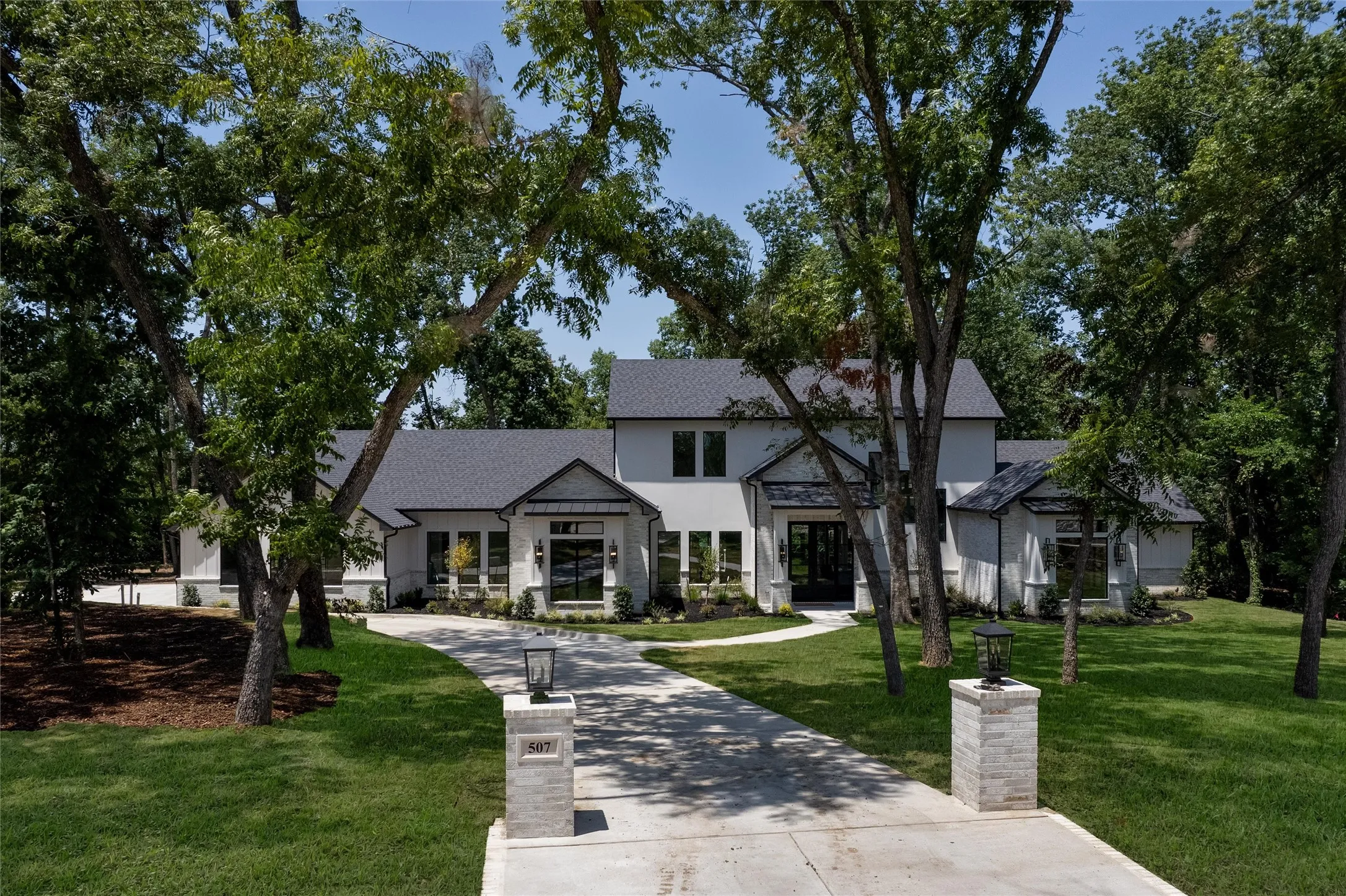 Beautiful tree lined driveway.
