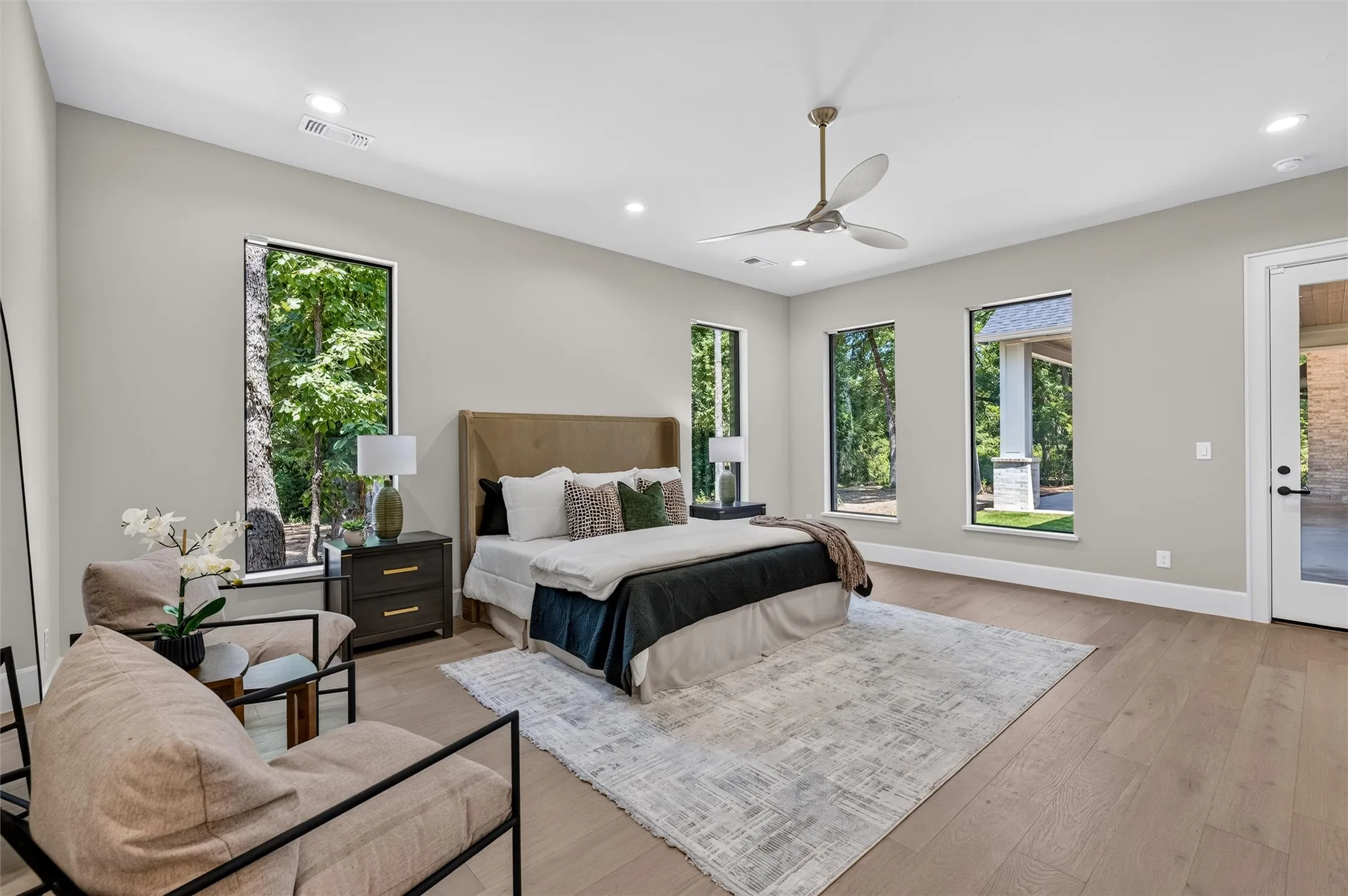 Primary bedroom has private access to patio.
