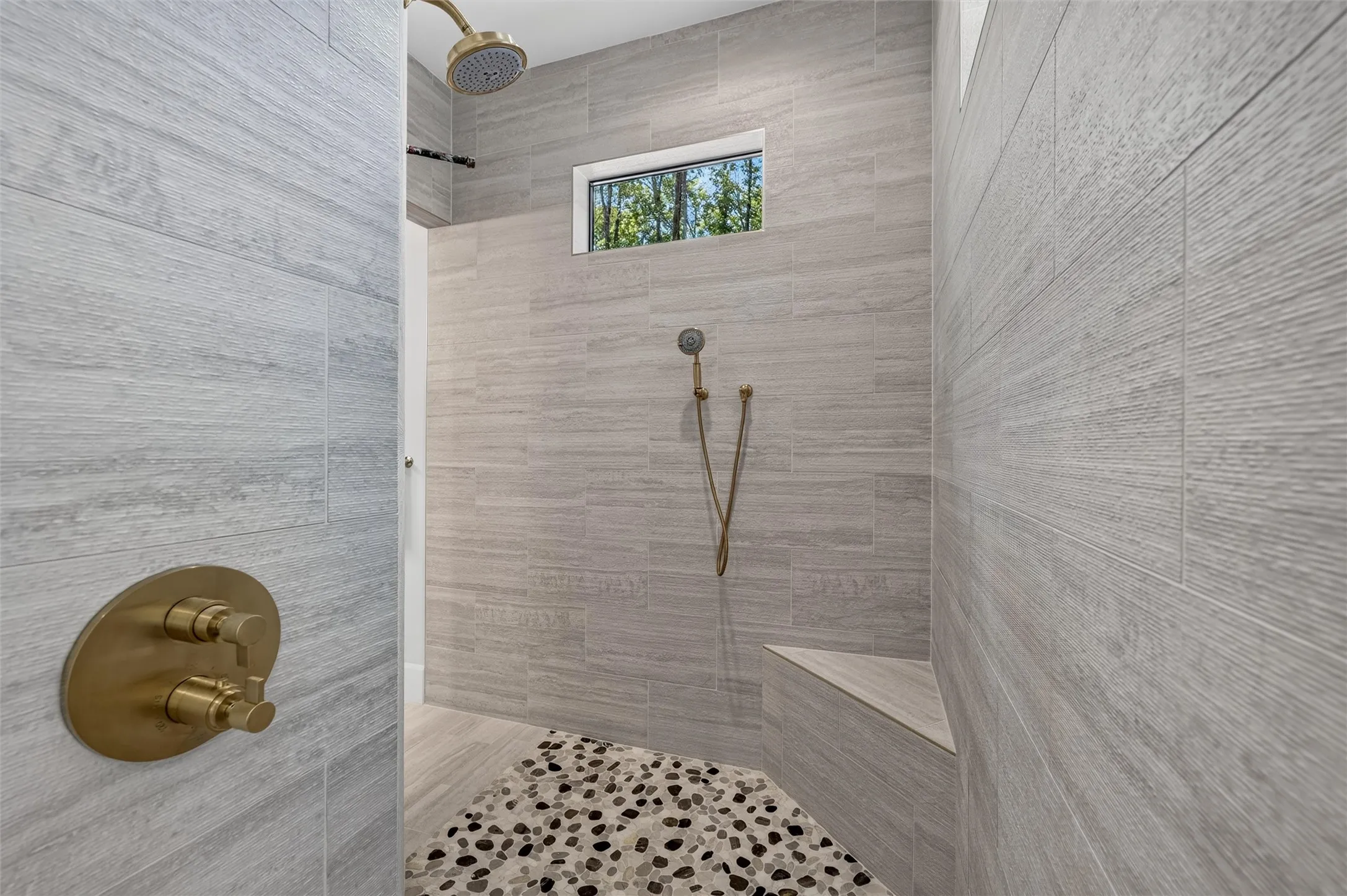 Walk in shower in ensuite primary bathroom.
