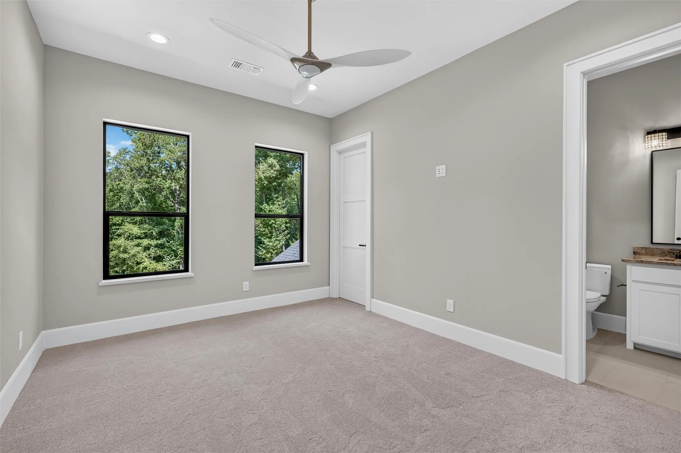 Secondary second floor bedroom with ensuite bathroom.
