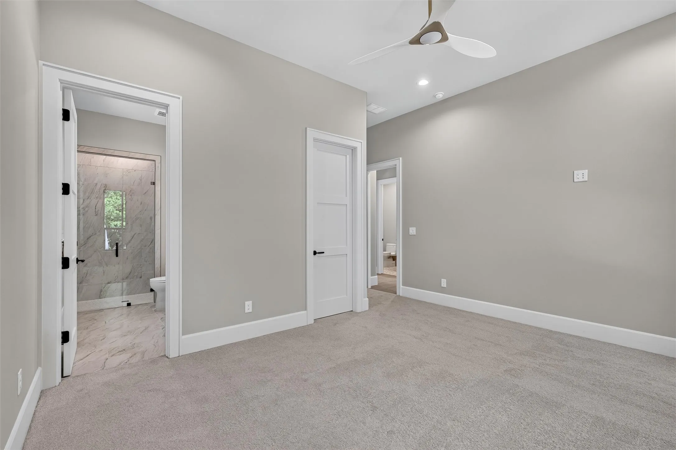 Secondary bedroom with ensuite bathroom.
