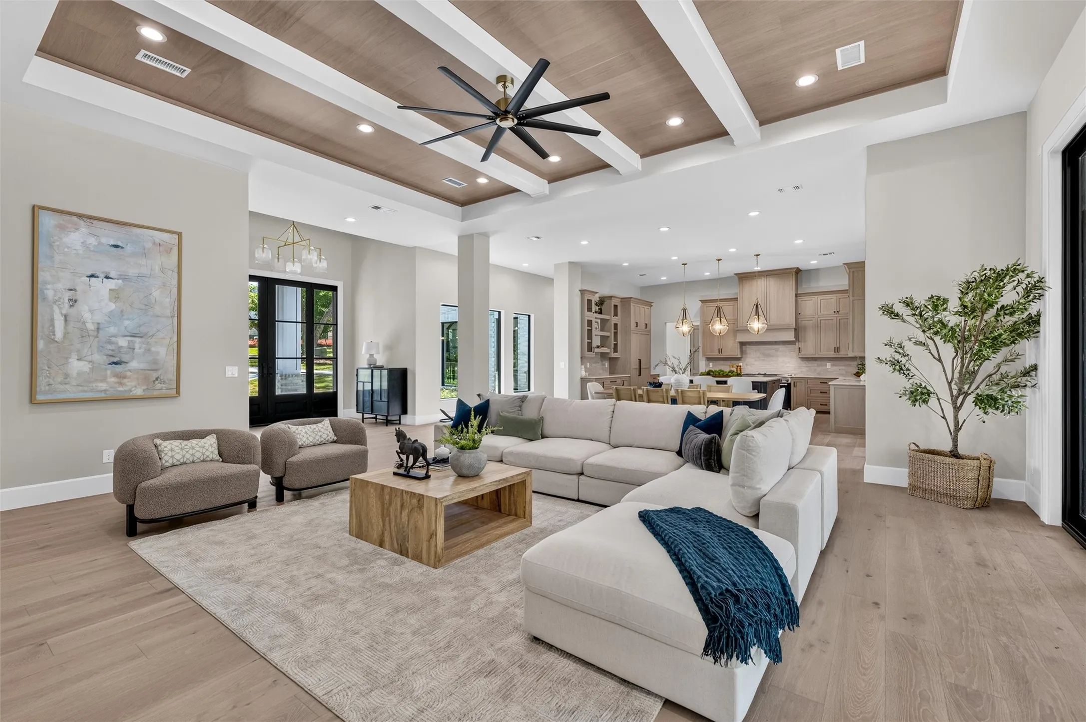 Living room opens to kitchen and entry.