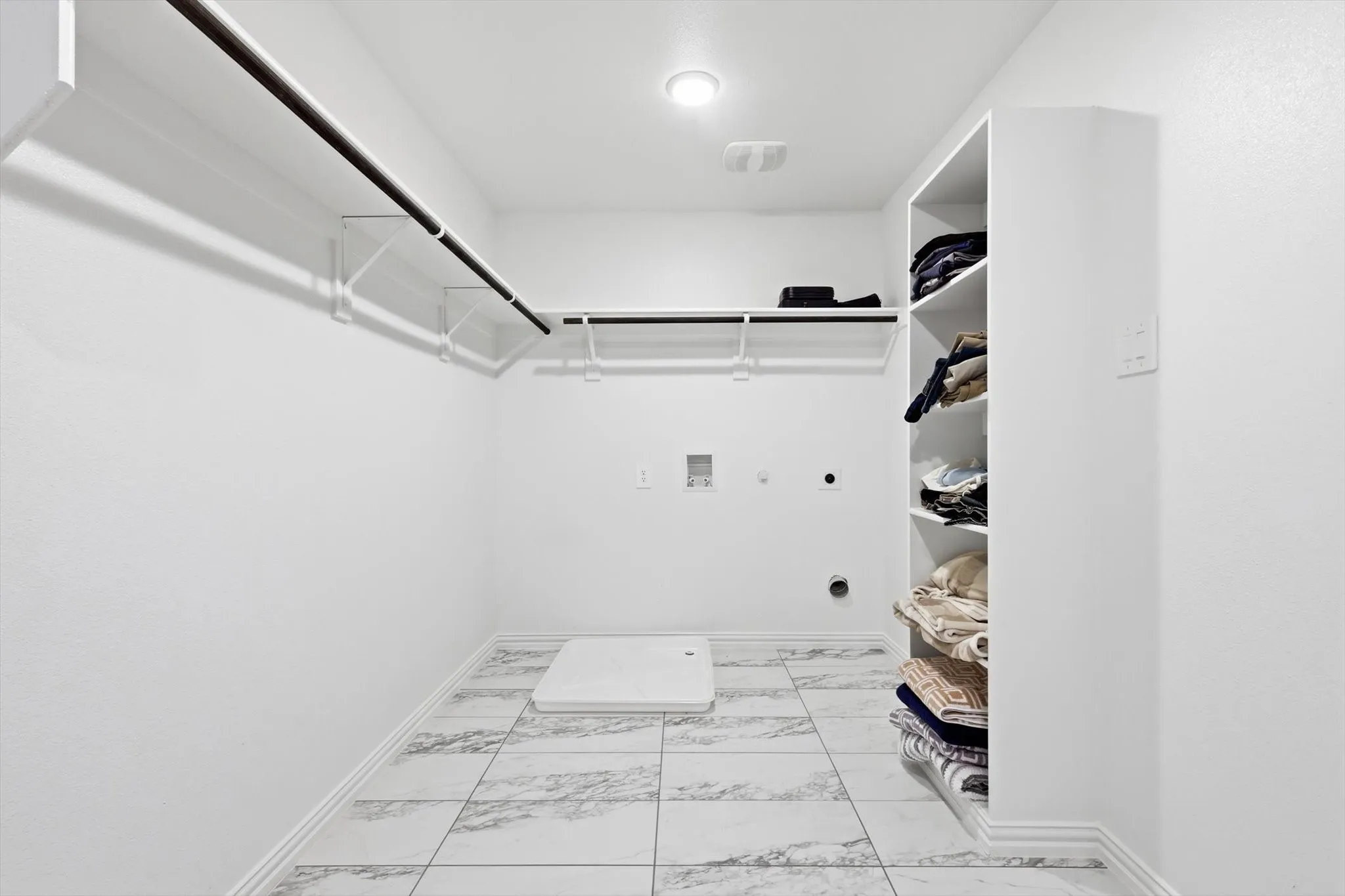 Master closet upstairs & 2nd laundry area