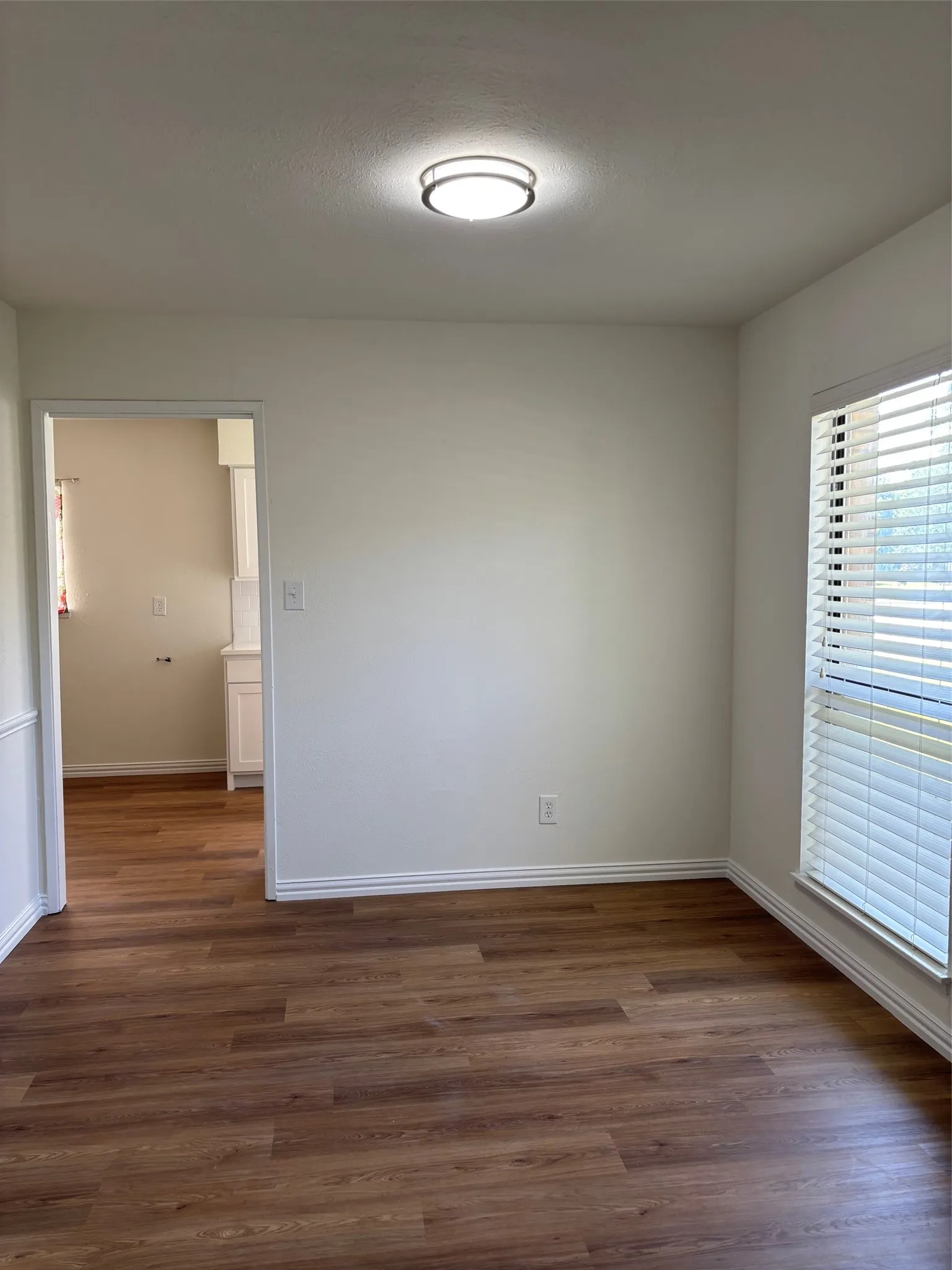 This room can be a formal living room, office, or dining room