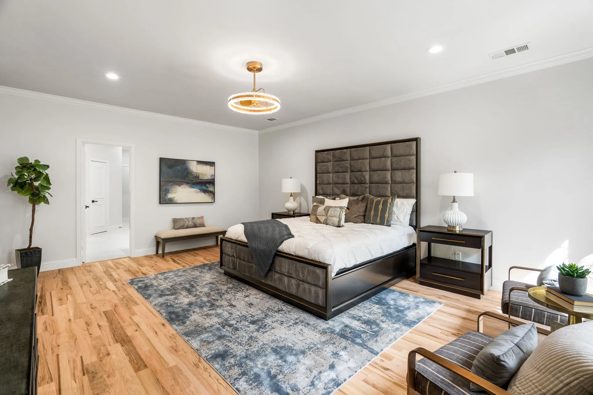 Bedroom featuring crown molding, light wood-style floors, and recessed lighting