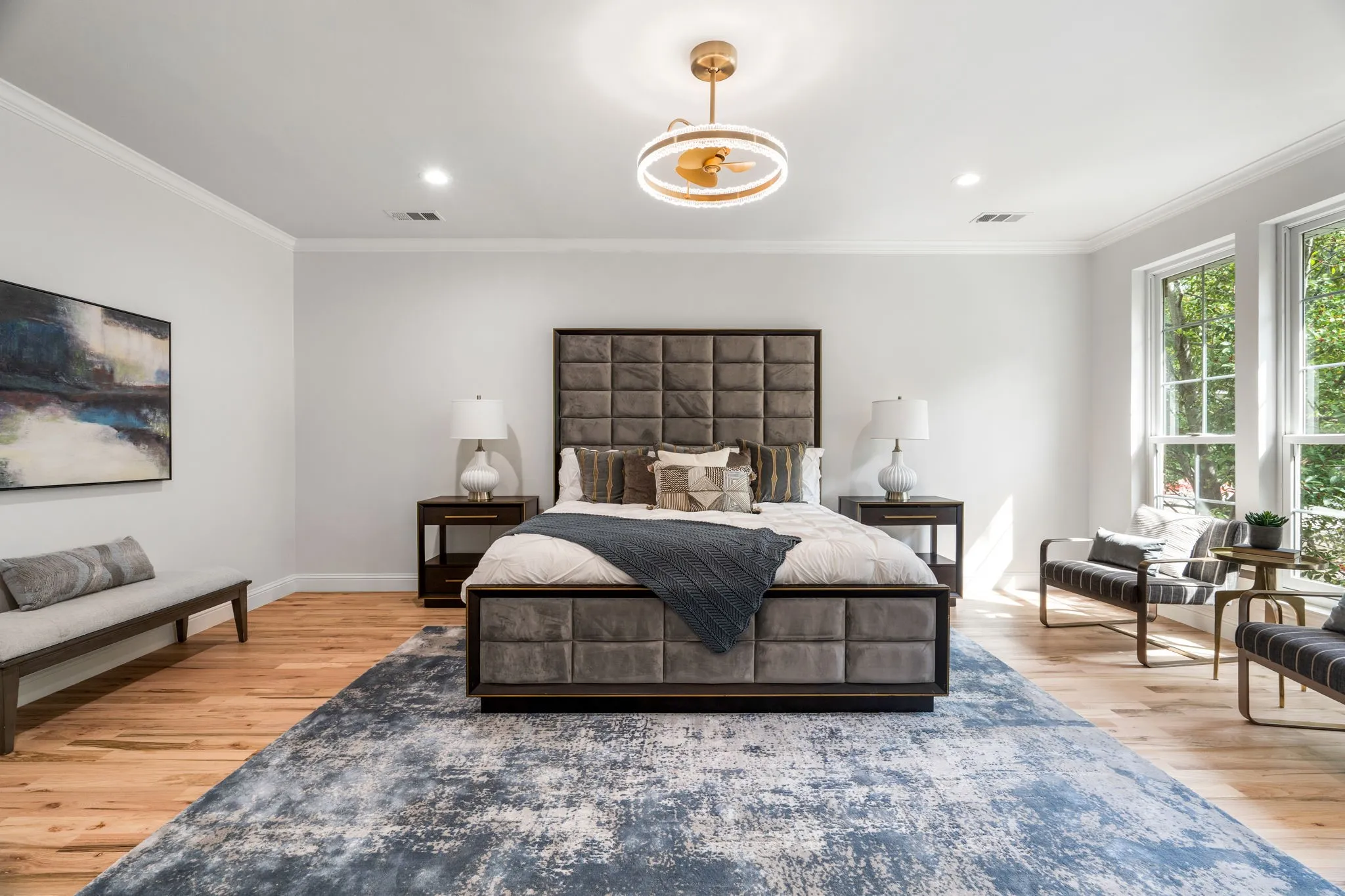 Bedroom featuring light wood finished floors, ornamental molding, and recessed lighting
